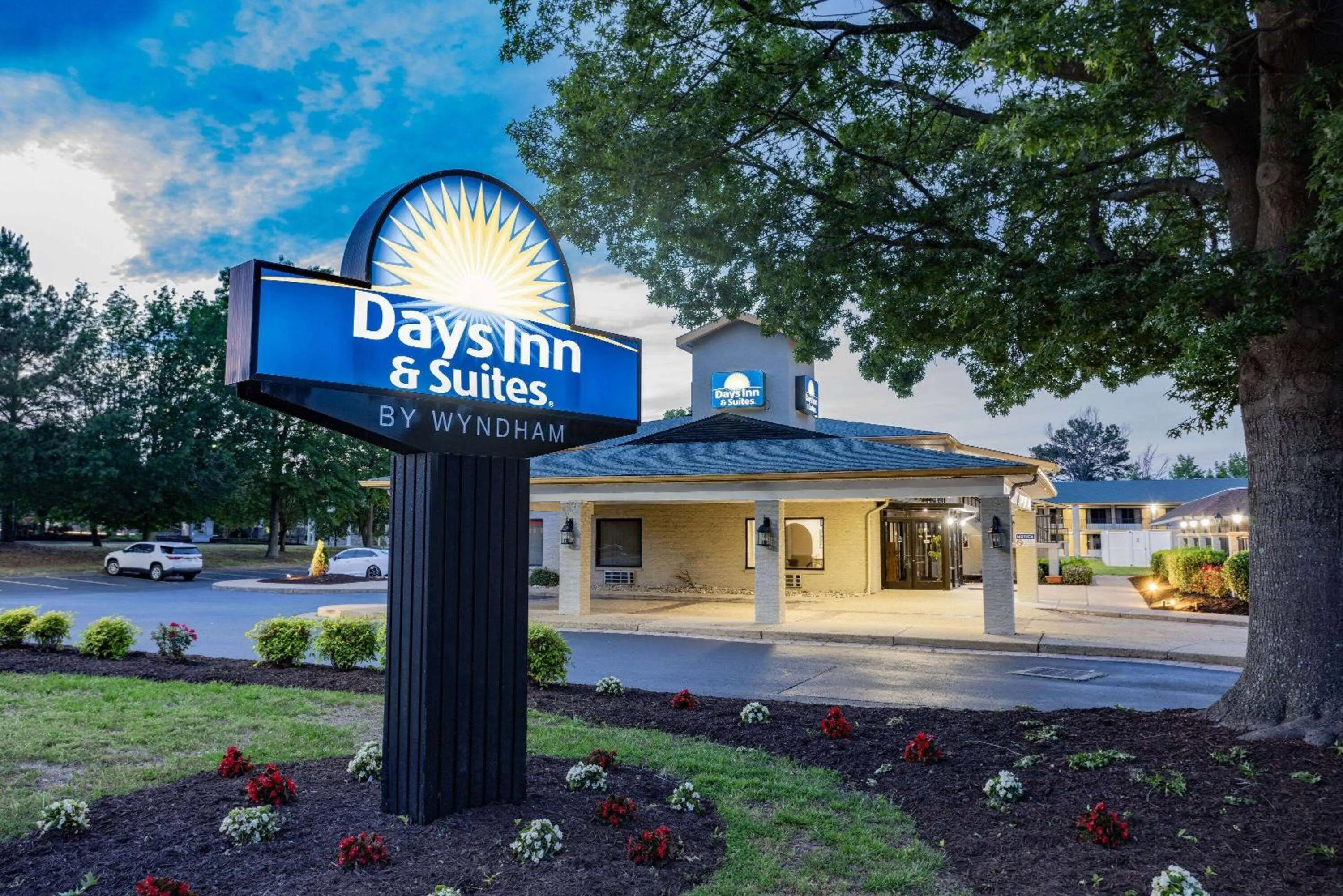 Property building in Days Inn & Suites by Wyndham Colonial