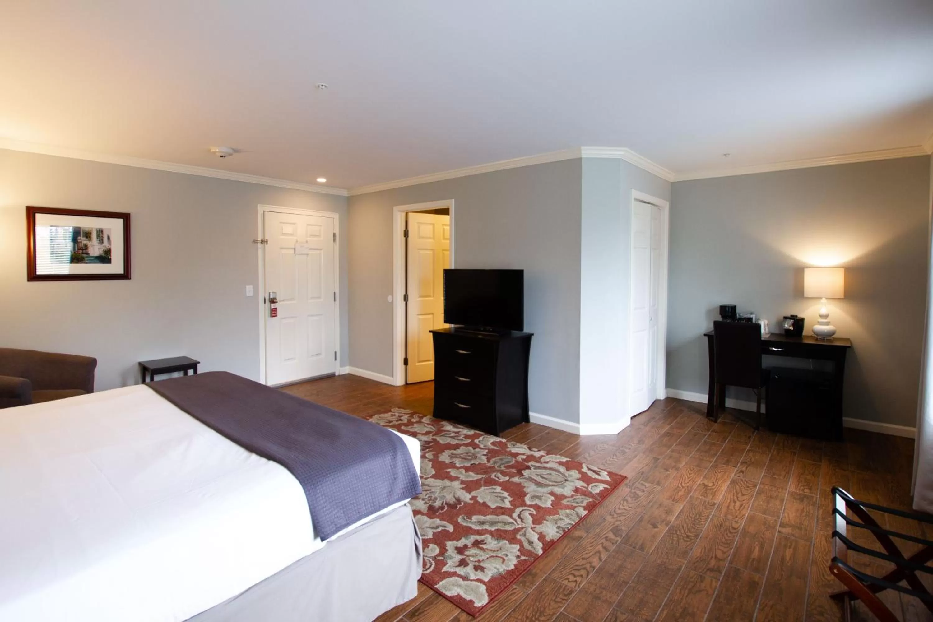 Bed in The Dahlonega Square Hotel