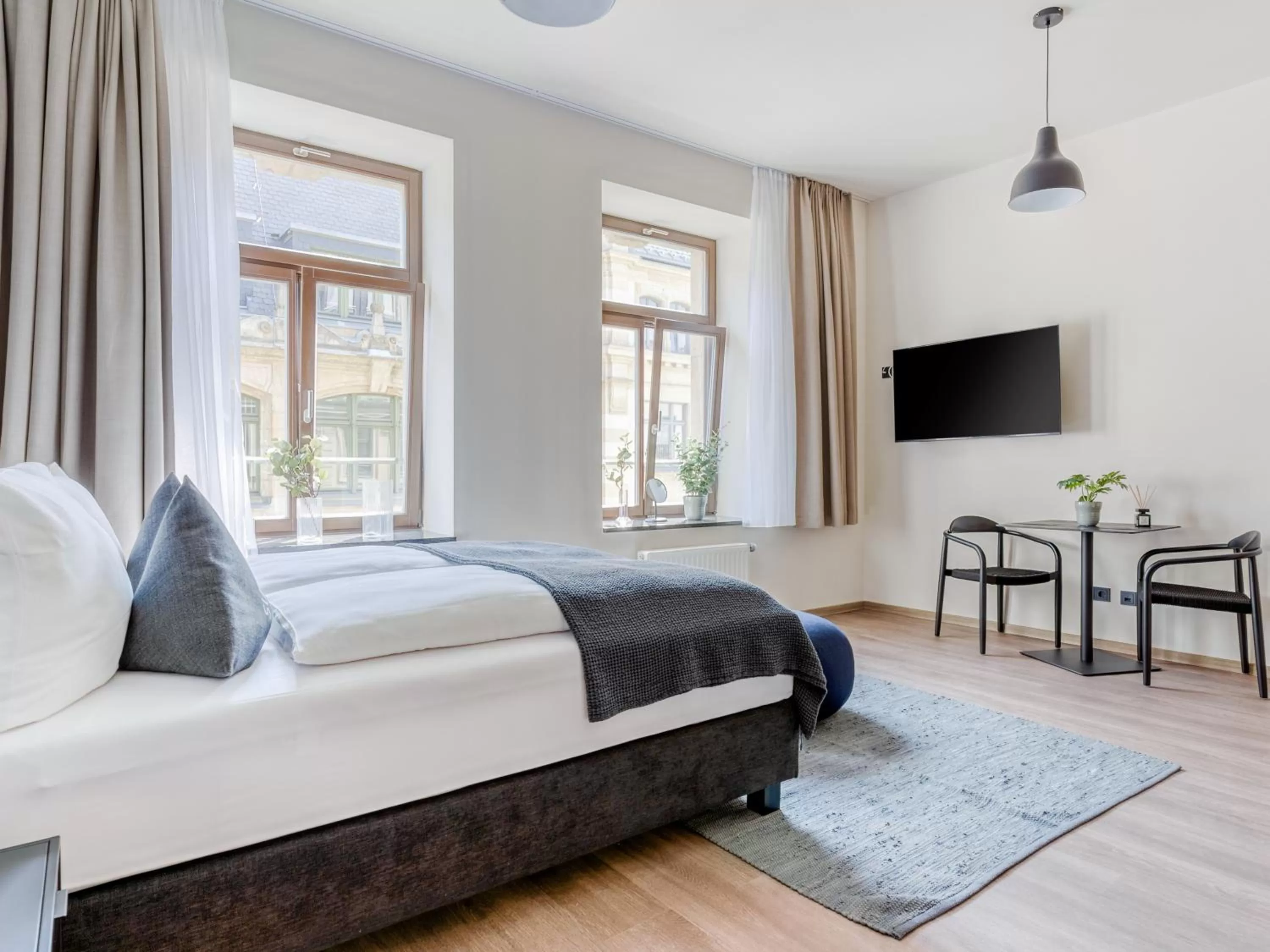 Bed in Limehome Leipzig Oelßner's Hof