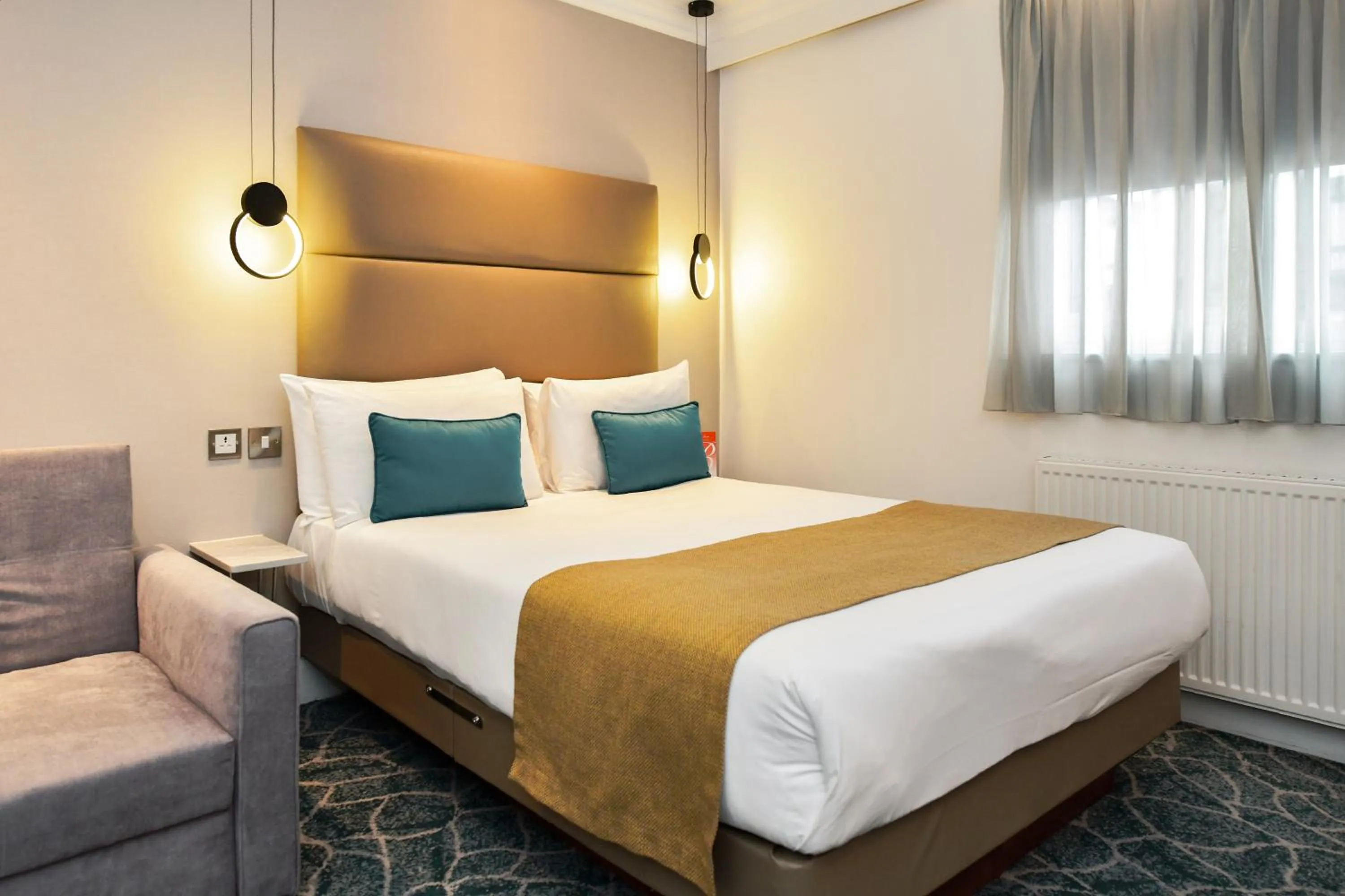 Bedroom in Queens Park Hotel