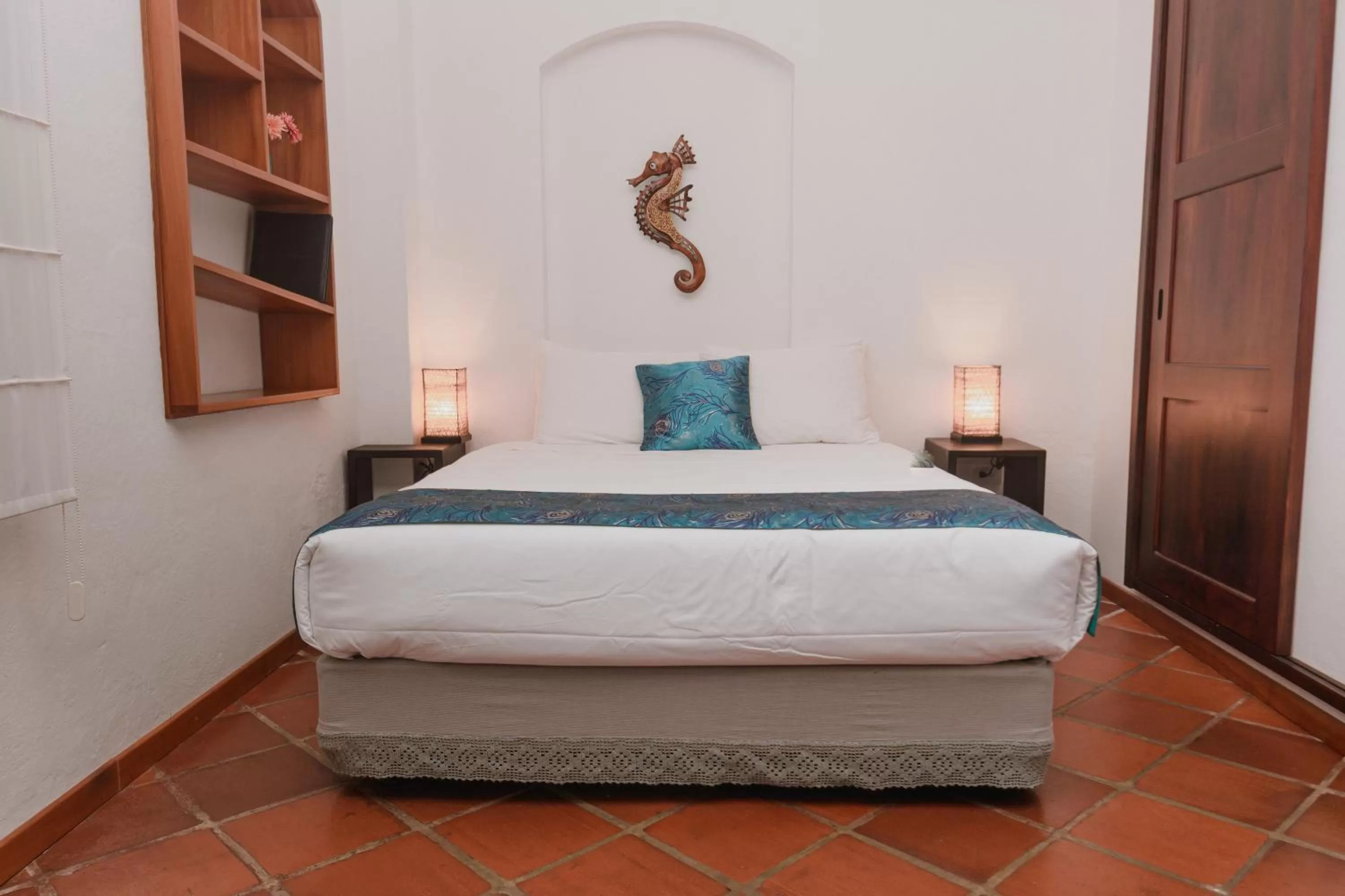 Bed in Hotel Galapagos Suites B&B