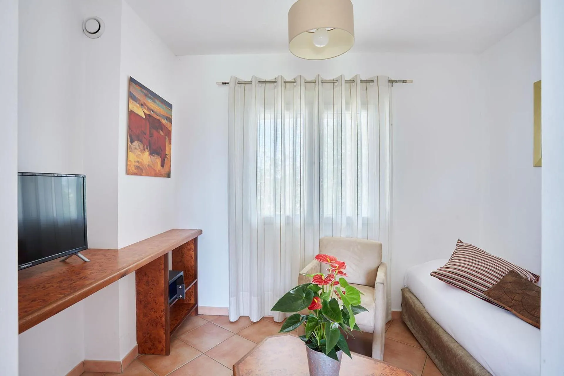 Bedroom in Logis Hôtel Le Rodin
