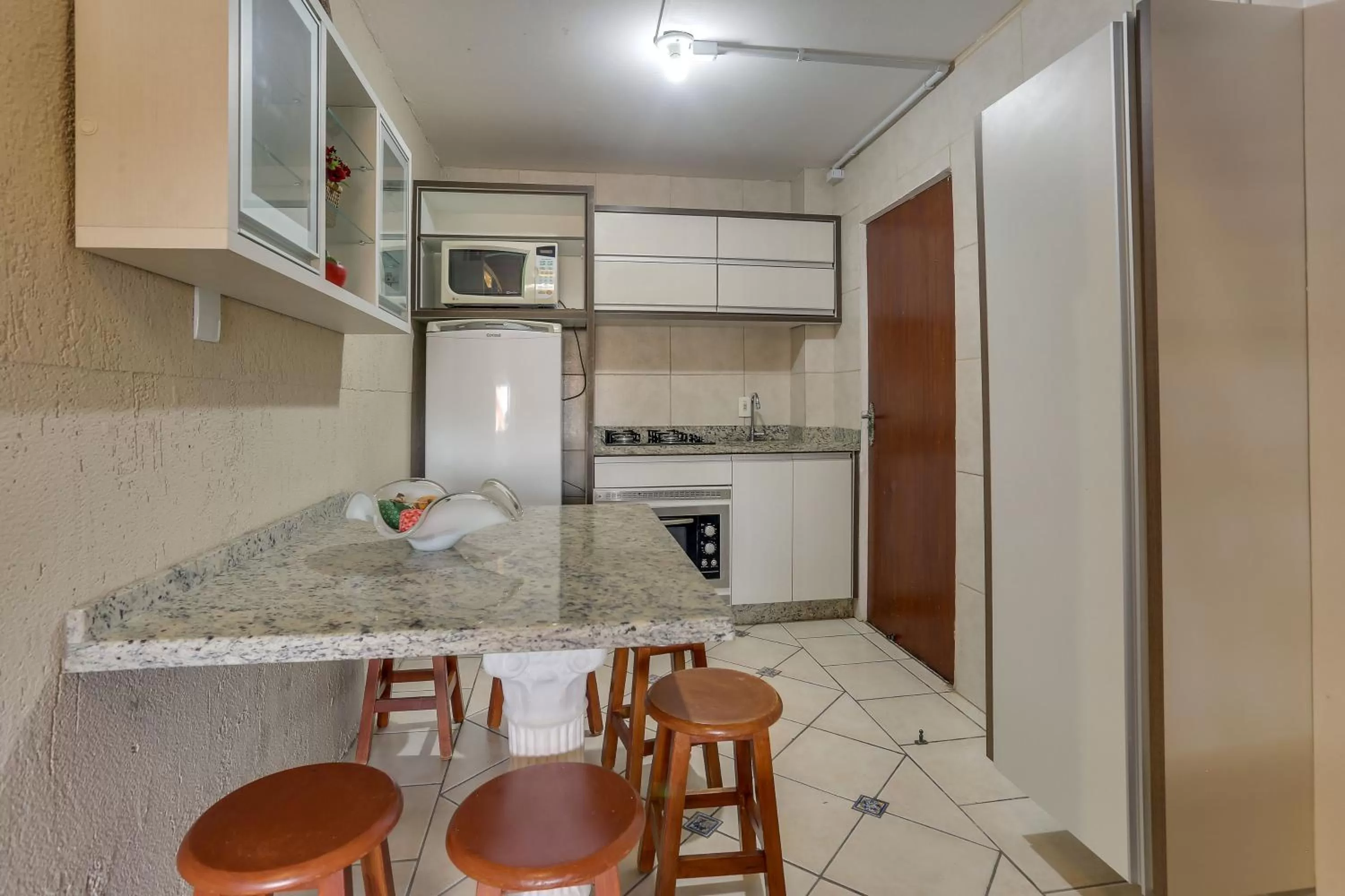 Kitchen or kitchenette in Pousada Recanto do Aconchego