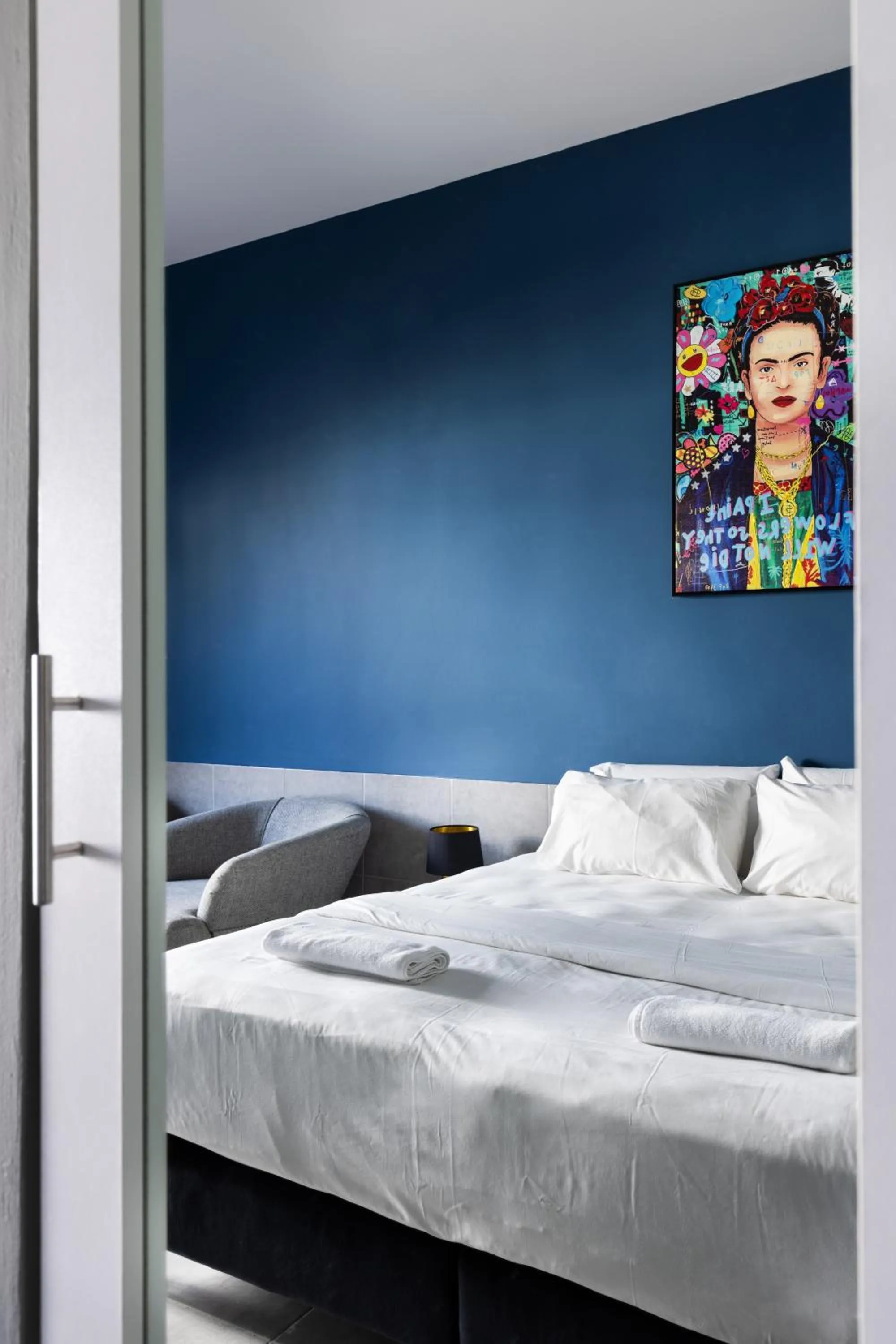 Bed in Liber Tel Aviv Sea Shore Suites BY RAPHAEL HOTELS