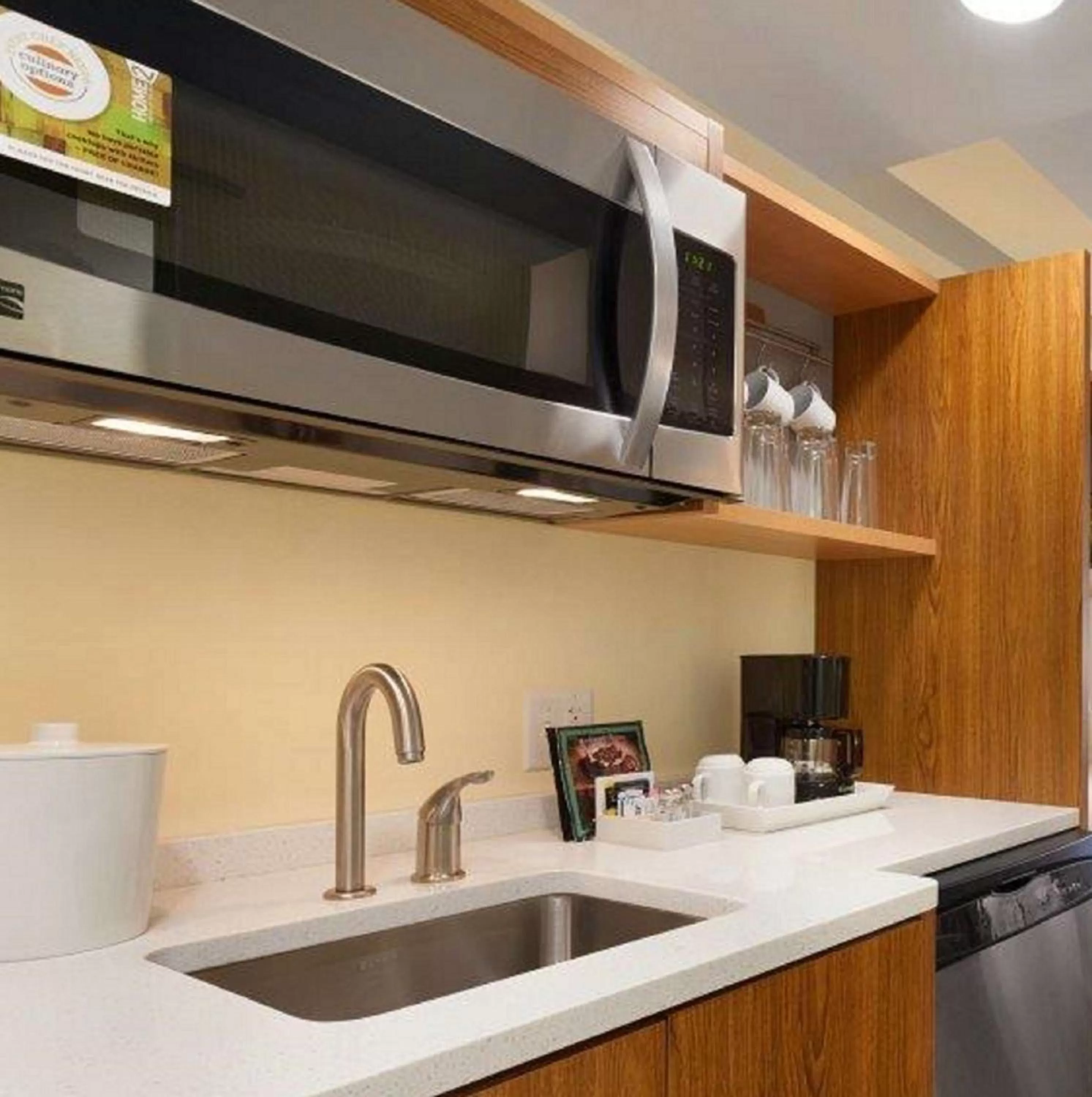 Kitchen or kitchenette in Home2 Suites by Hilton Champaign/Urbana