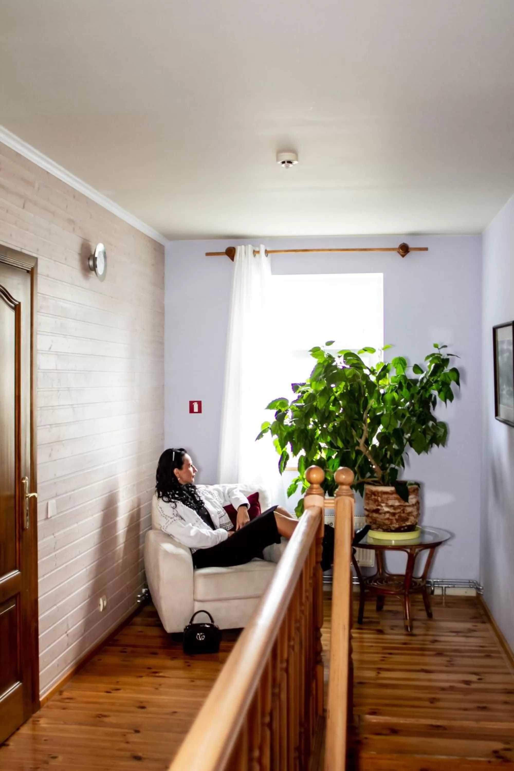 Communal lounge/ TV room in Sunset Hotel