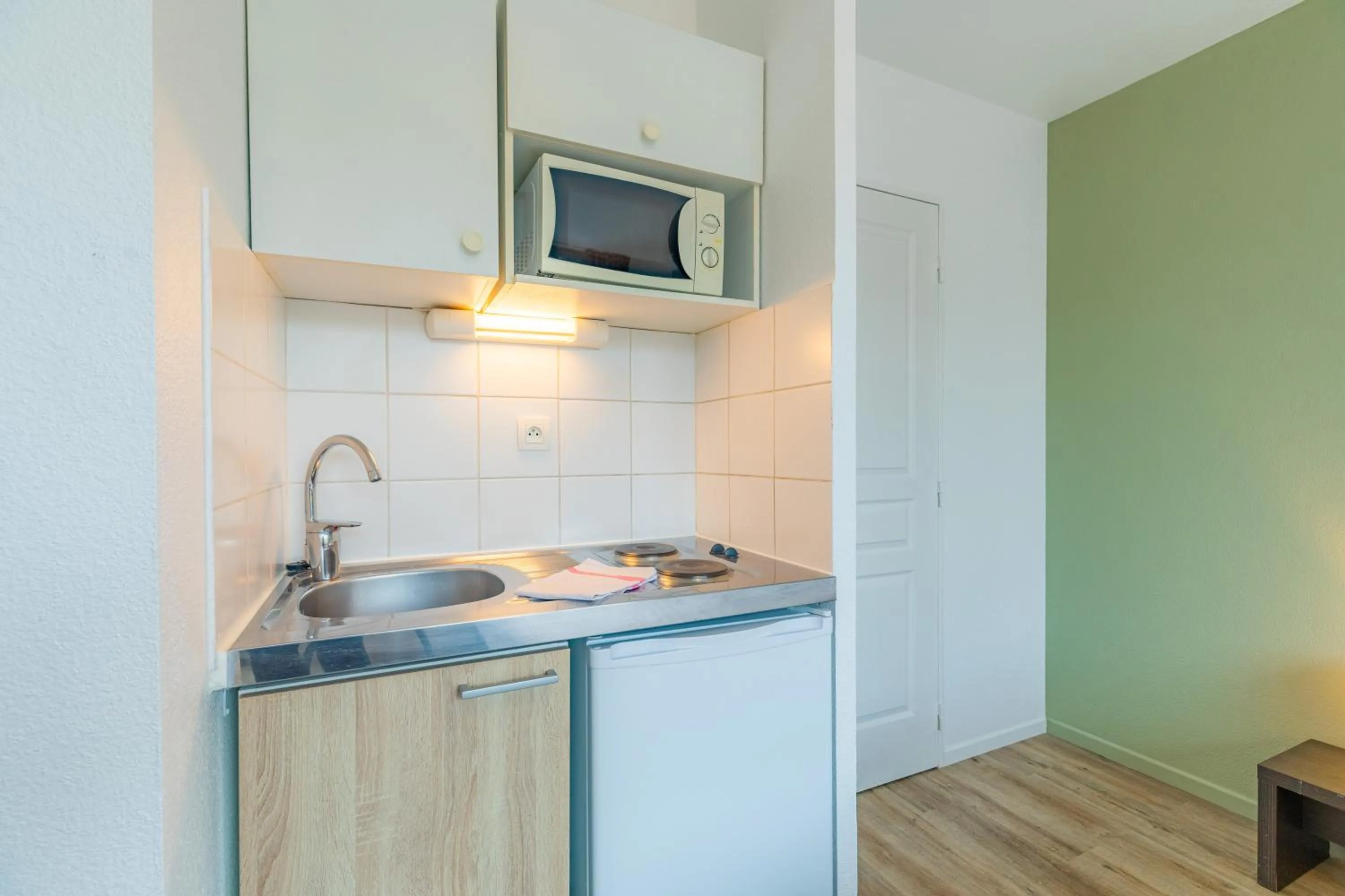 Kitchen or kitchenette in Appart'City Classic Bourg-en-Bresse