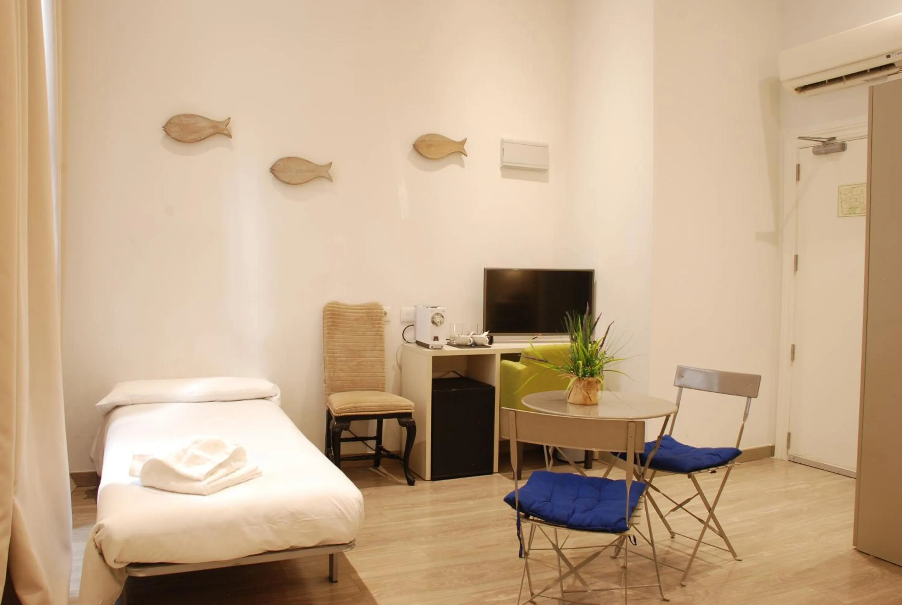 Bed in Hotel San Lorenzo Boutique Plaza