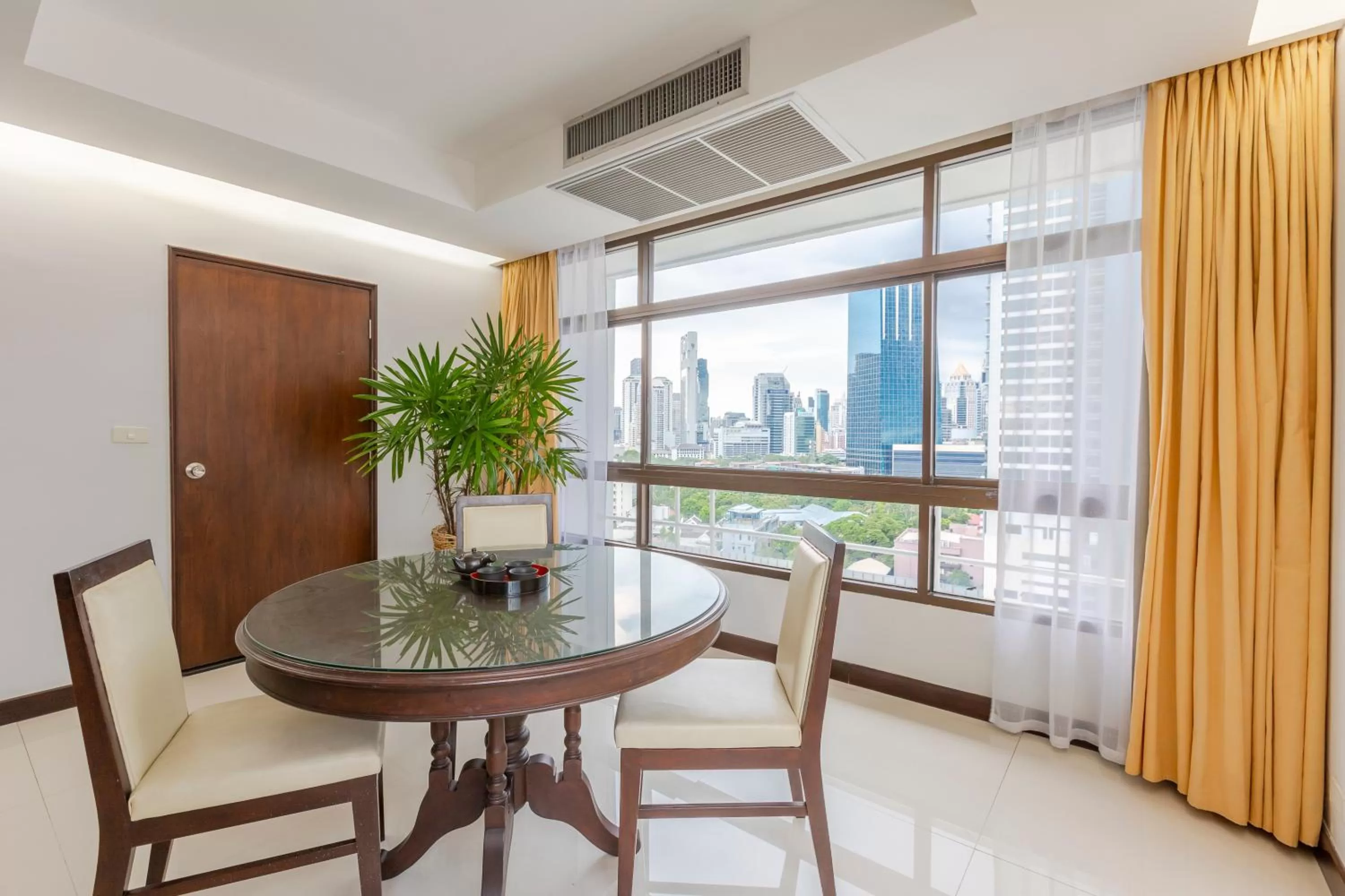 Living room in Pinnacle Lumpini Park Hotel
