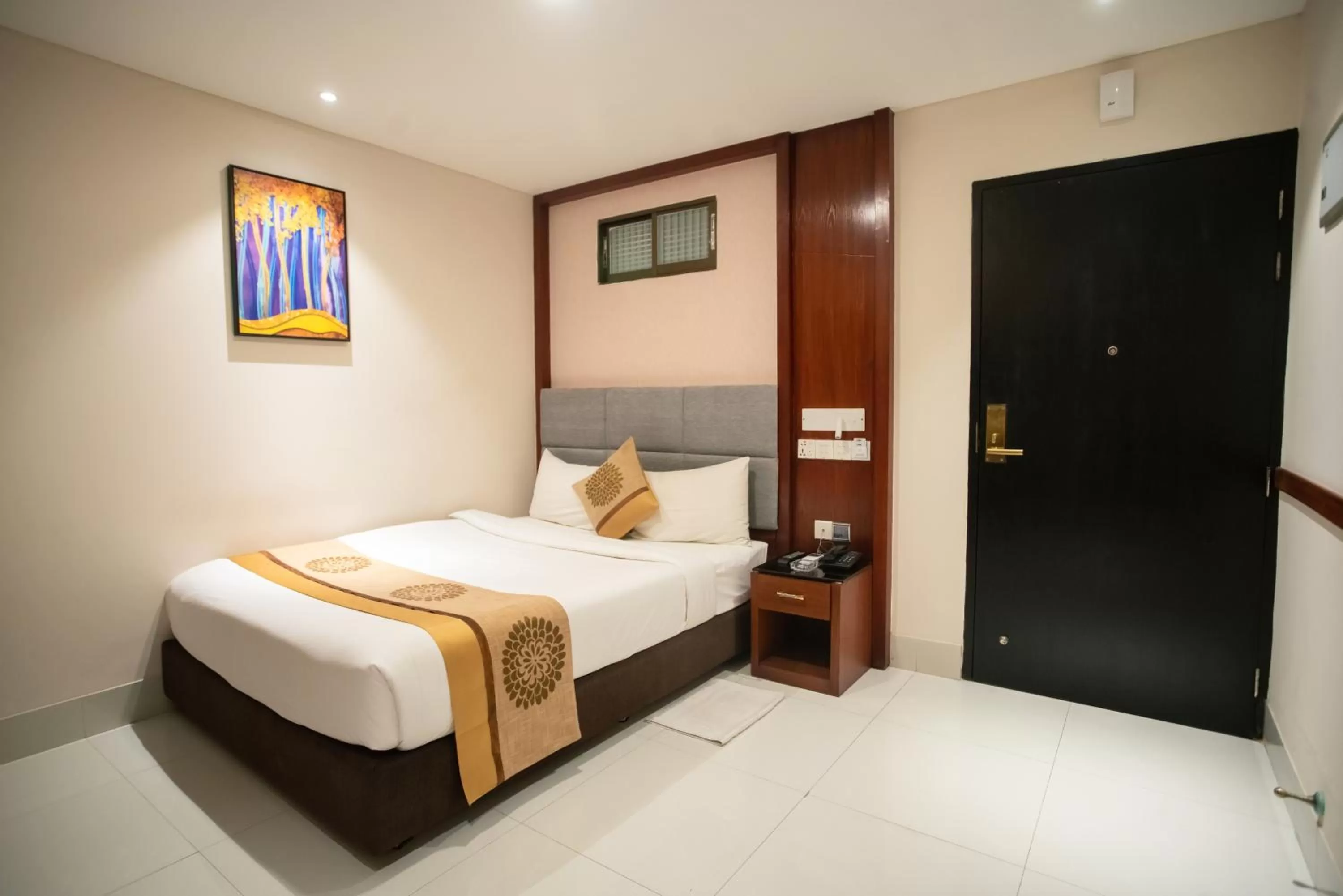 Bed in Jatra Hotel Grand Royal