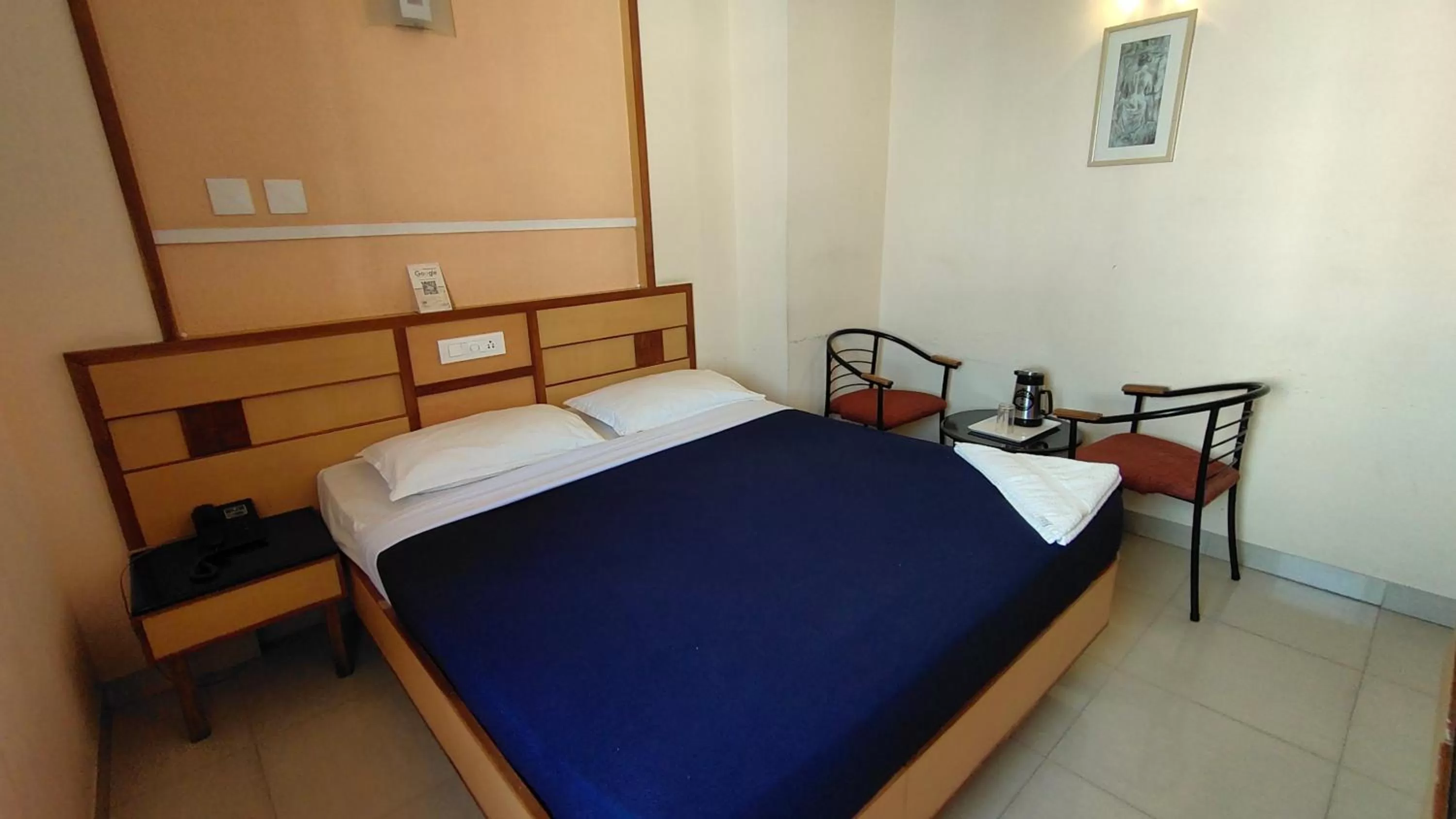 Bed in Hotel Aishwarywaa