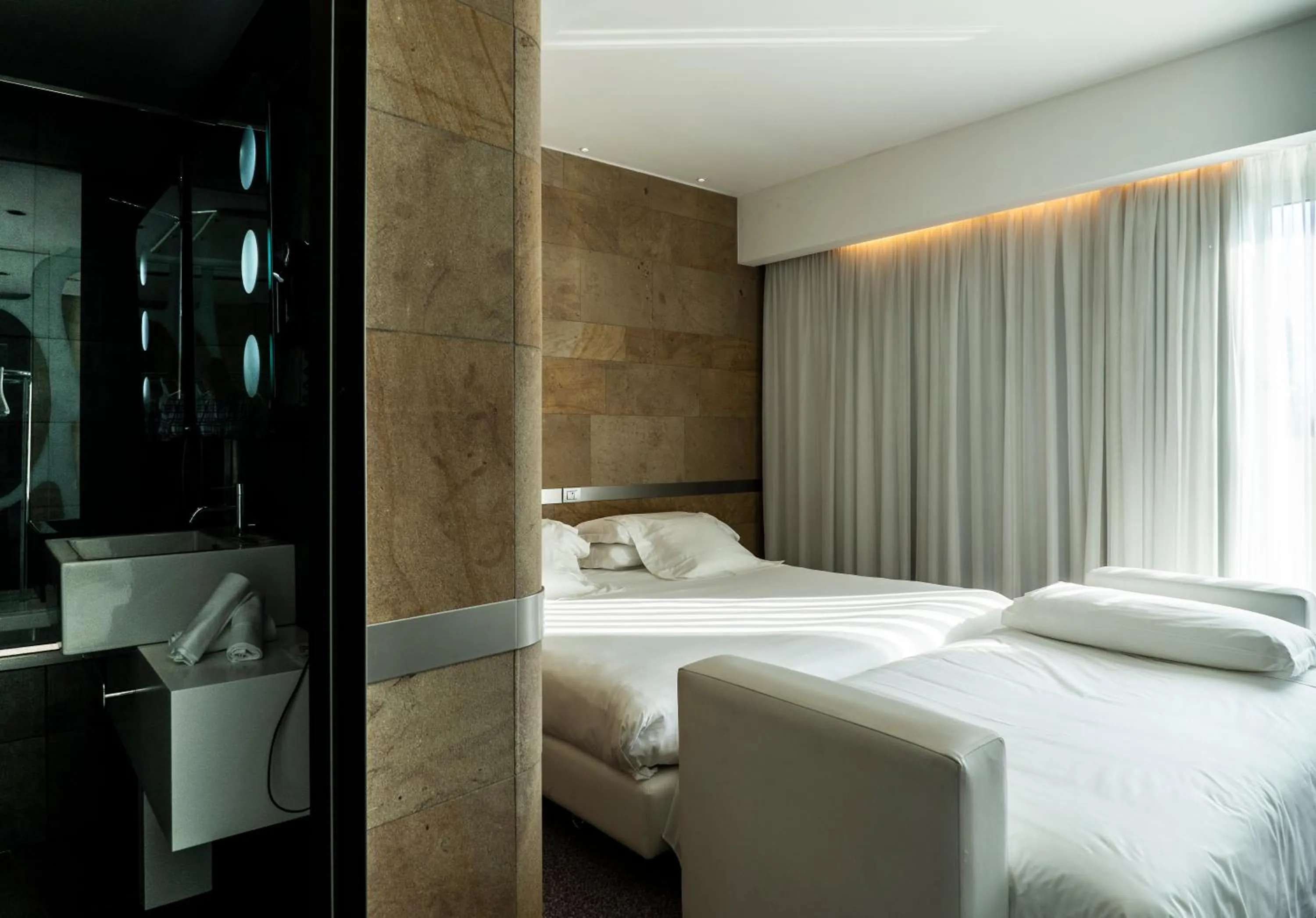 Bed in A Point Arezzo Park Hotel