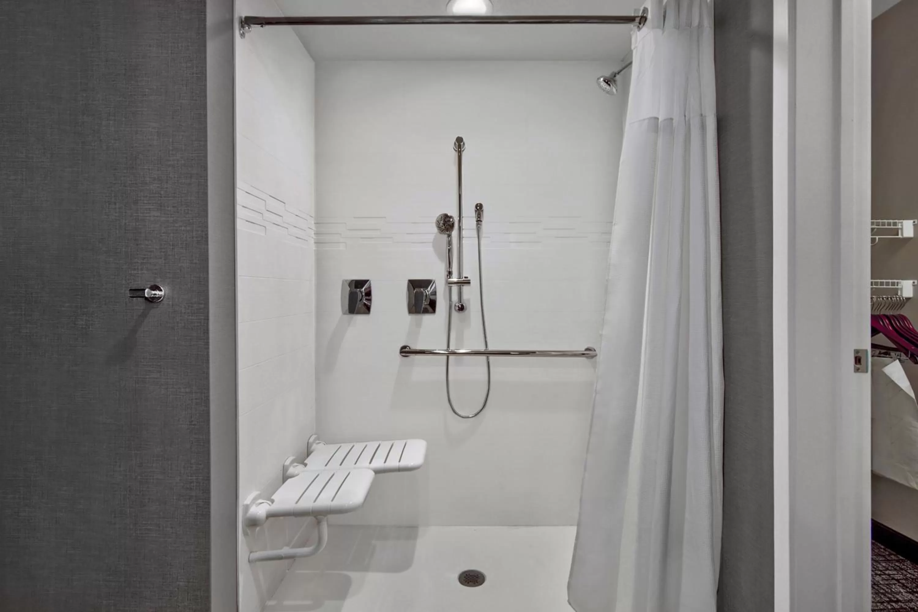 Bathroom in Residence Inn by Marriott Orlando at FLAMINGO CROSSINGS Town Center