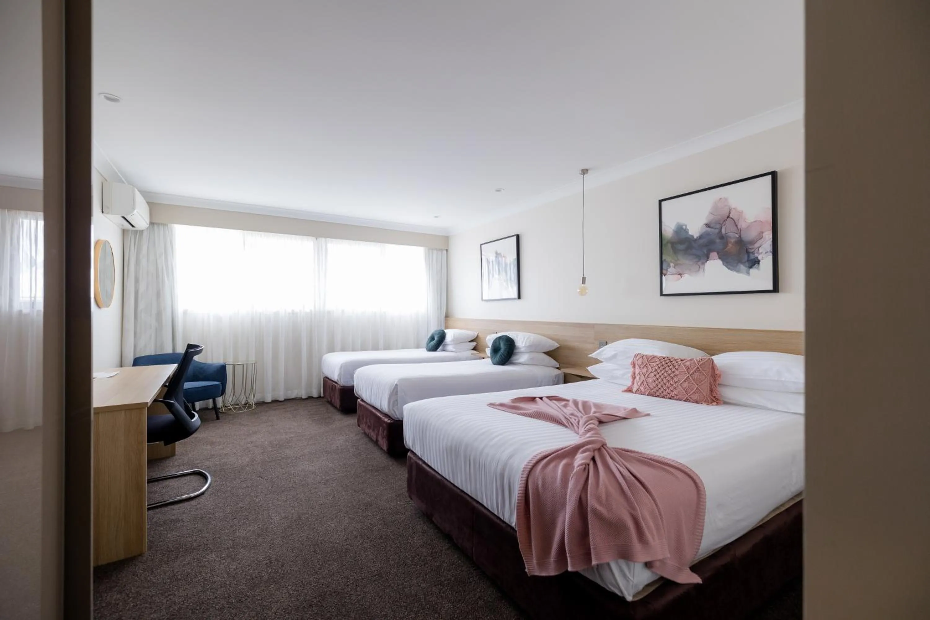 Bed in Central Caleula Motor Lodge