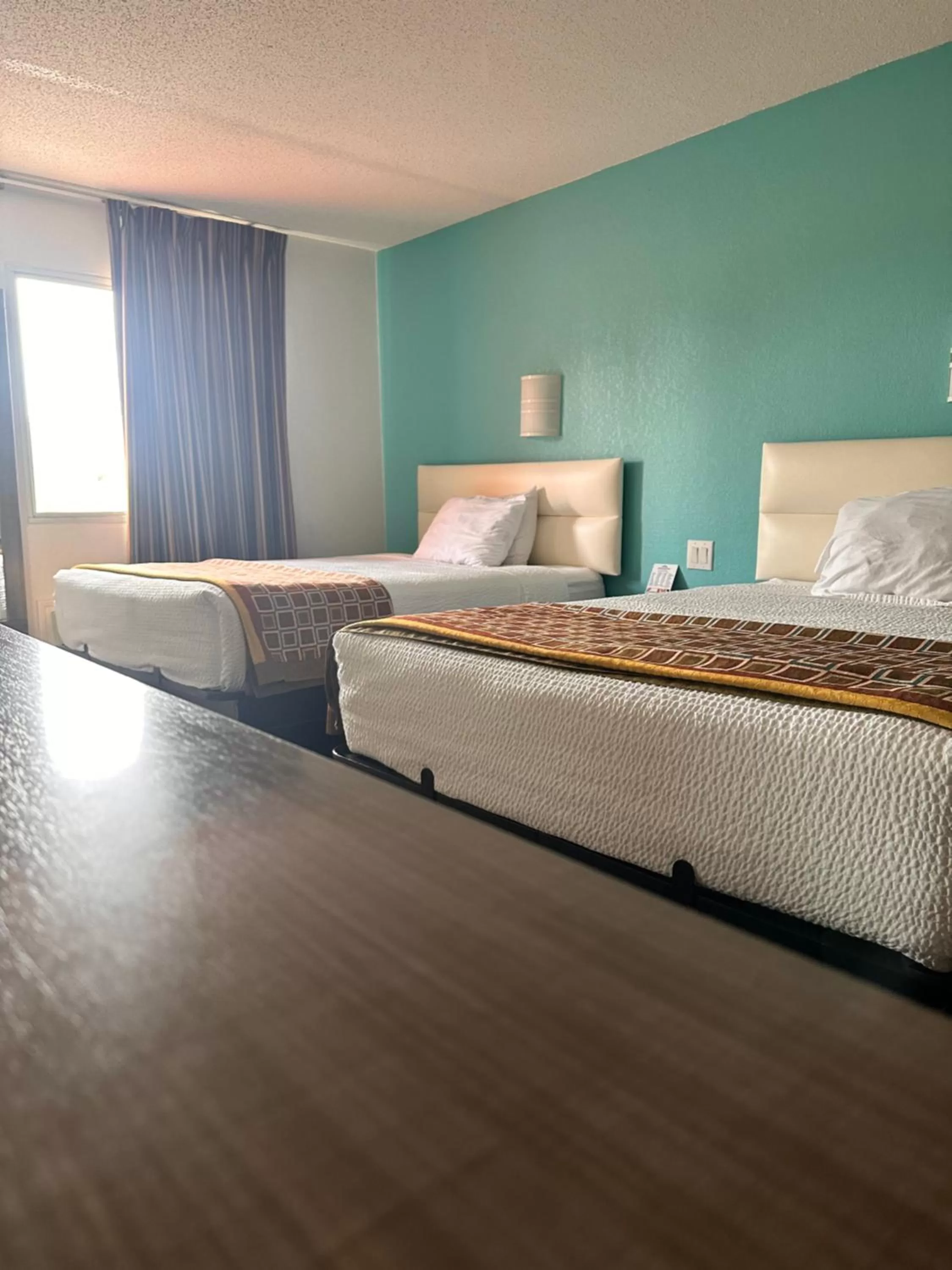 Bed in Howard Johnson by Wyndham Clarksville Tennessee