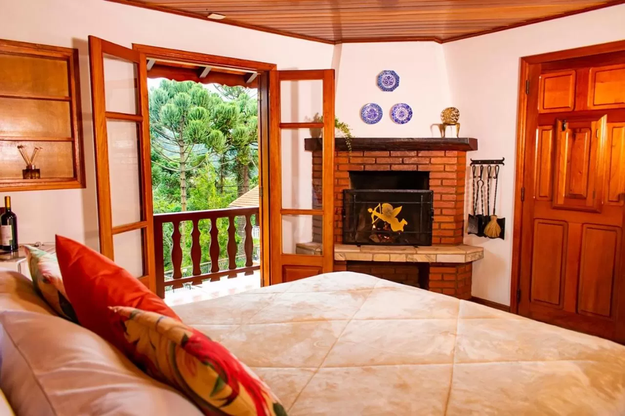 Bed in Pousada Ricanto Amore Mio