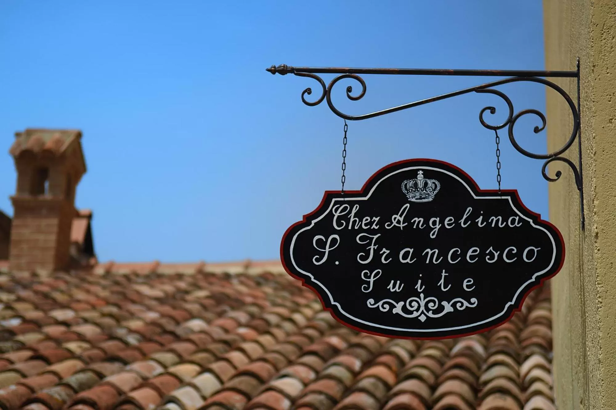 Property logo or sign in San Francesco Suite