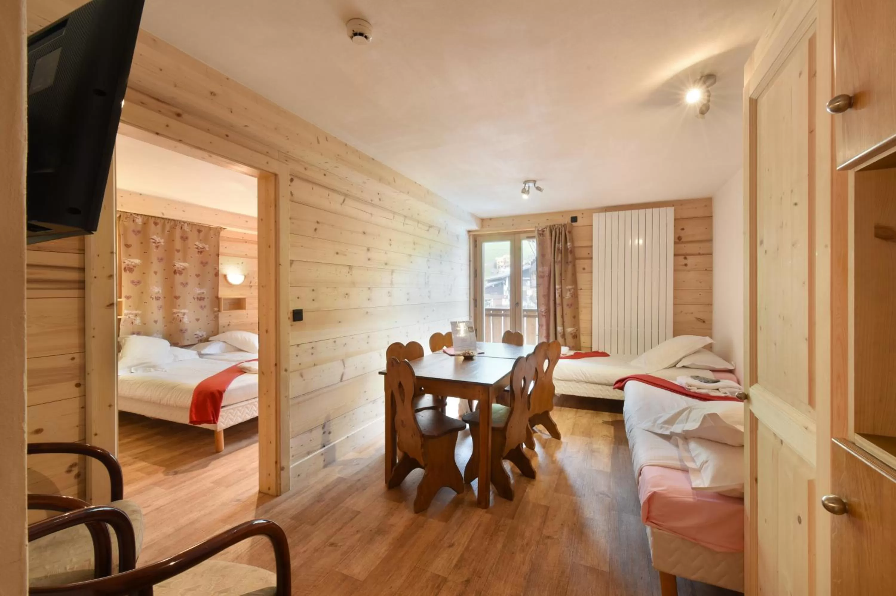 Photo of the whole room, Bed in Loc'Hotel Alpen Sports