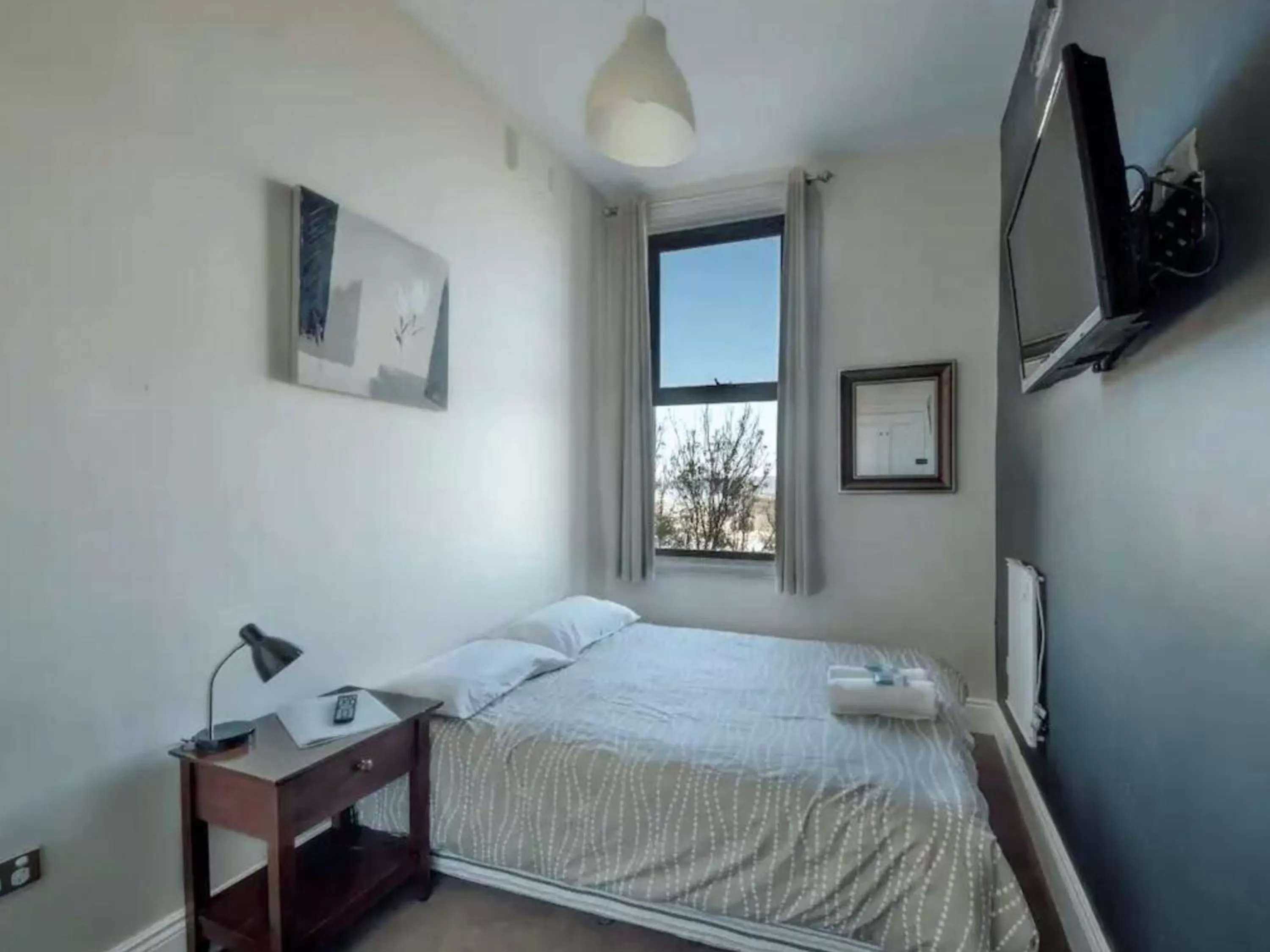 Bed in Six Degrees Boutique Hotel