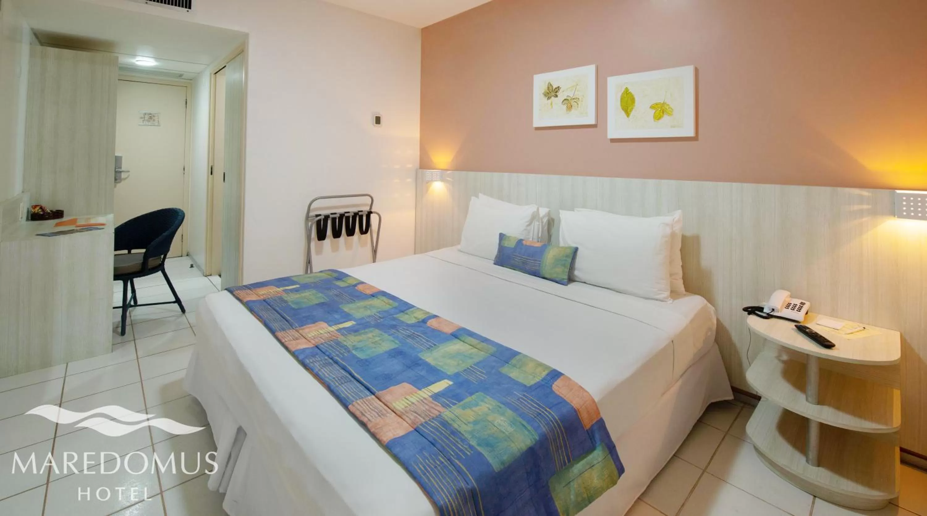 Bed in Maredomus Hotel