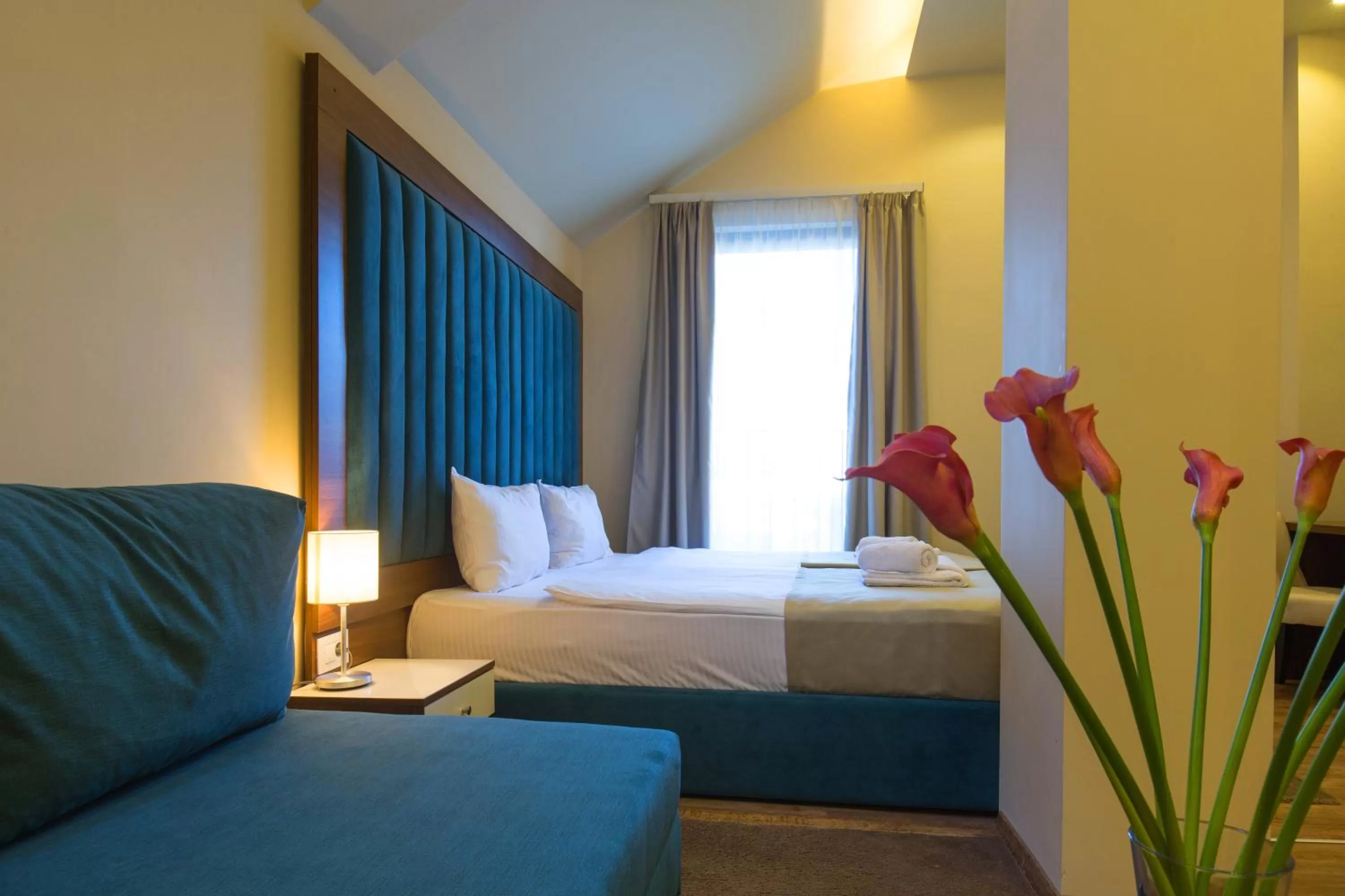 Bed in Marquise Hotel Garni