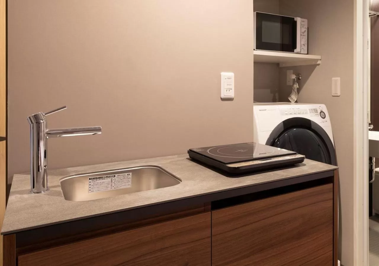 Kitchen or kitchenette in Tokyu Stay Sapporo Odori