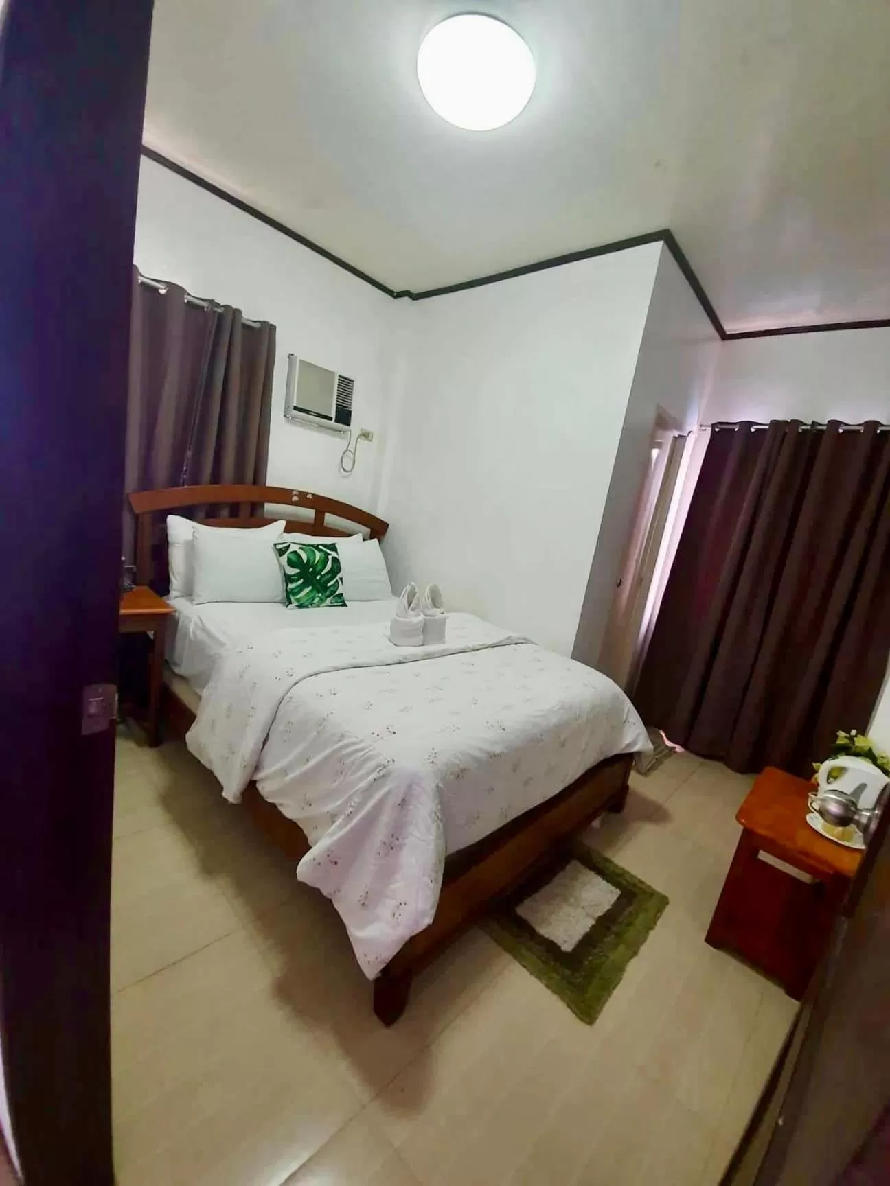Bed in Kalis Viewpoint Lodge Coron