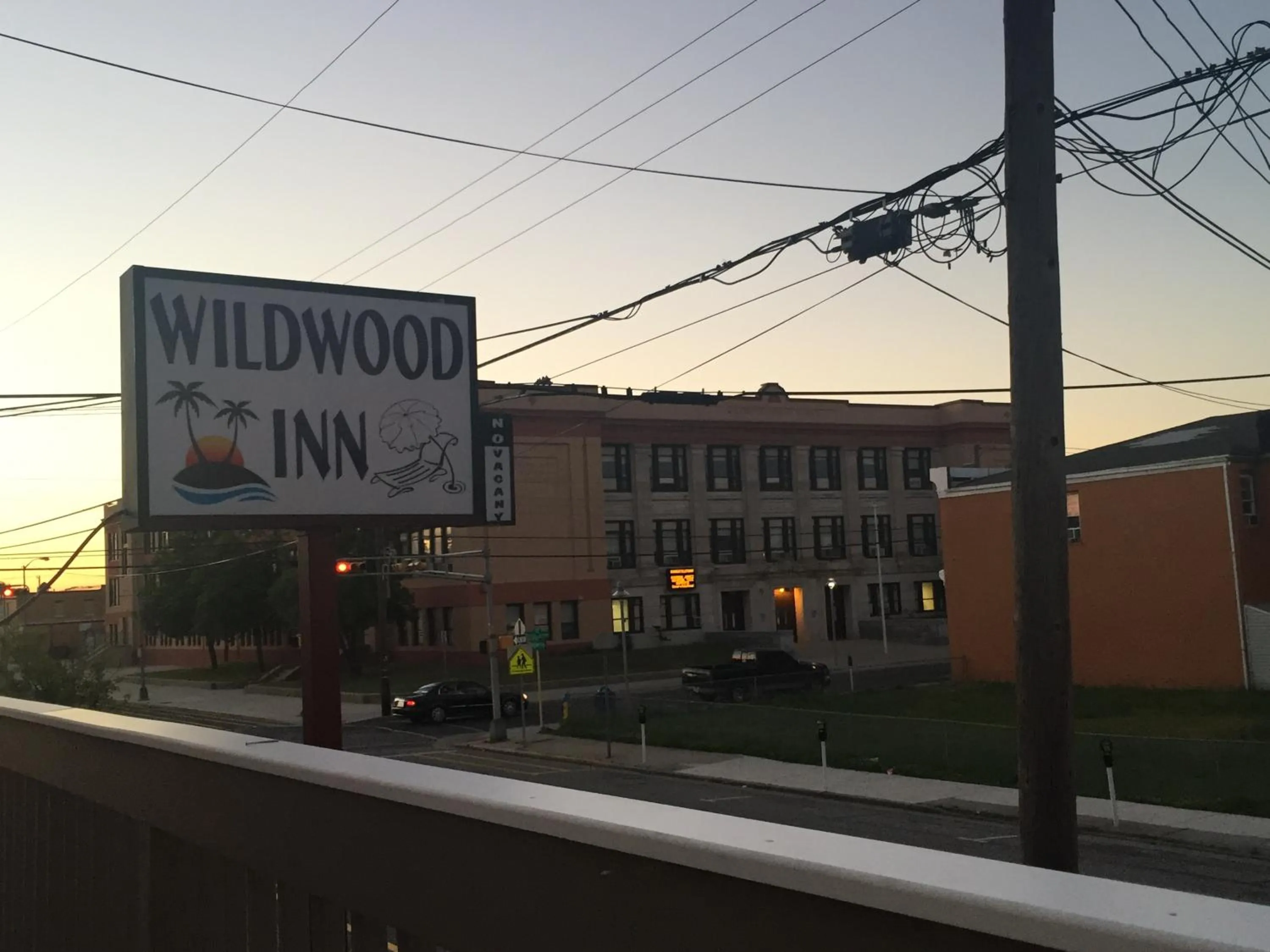 Property logo or sign in Wildwood Inn Hotel Travelodge Beach & Boardwalk