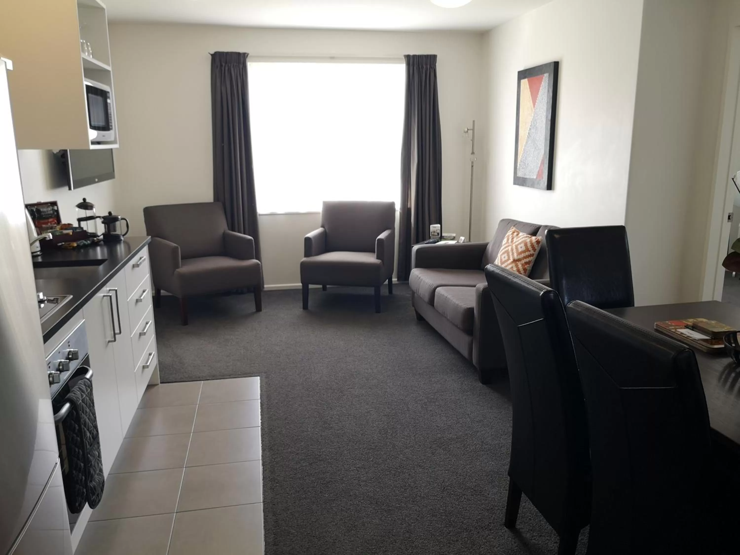 Kitchen or kitchenette in Airport Palms Motel