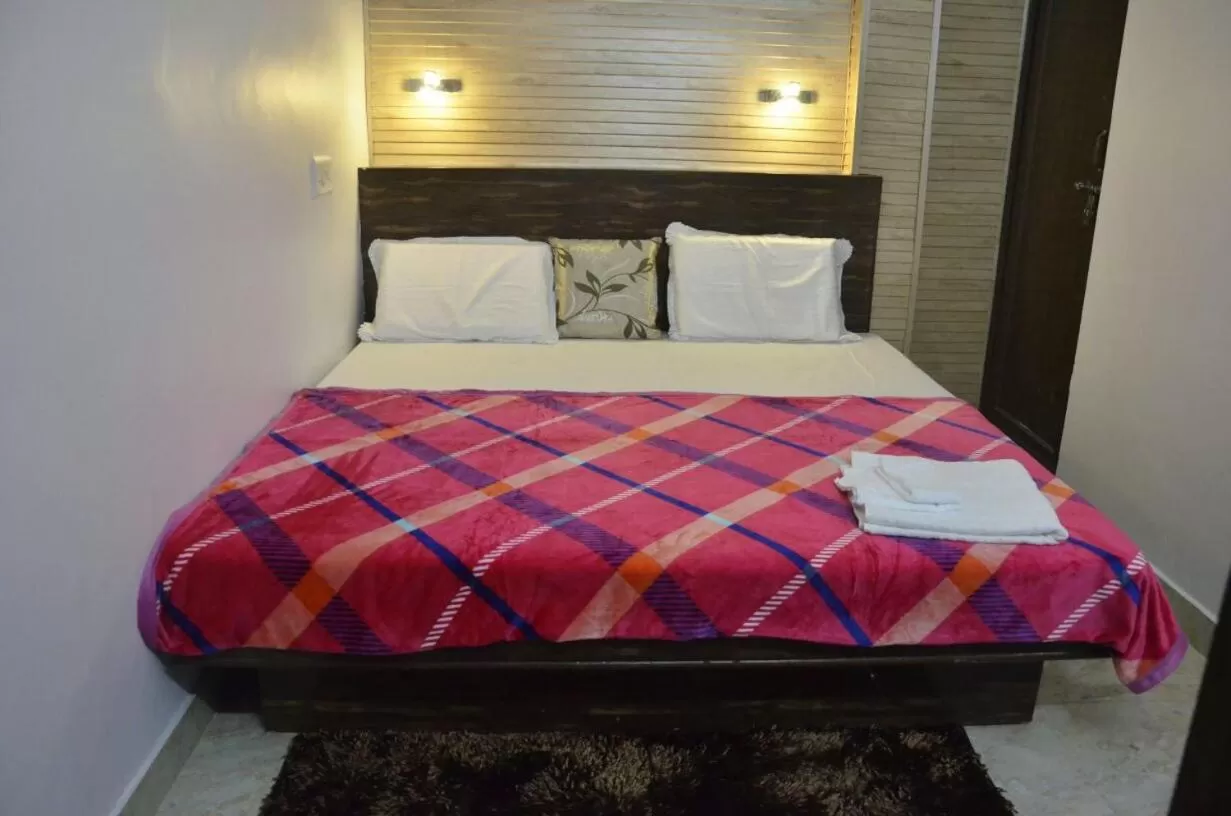 Bed in Hotel Kanha Inn Charbagh