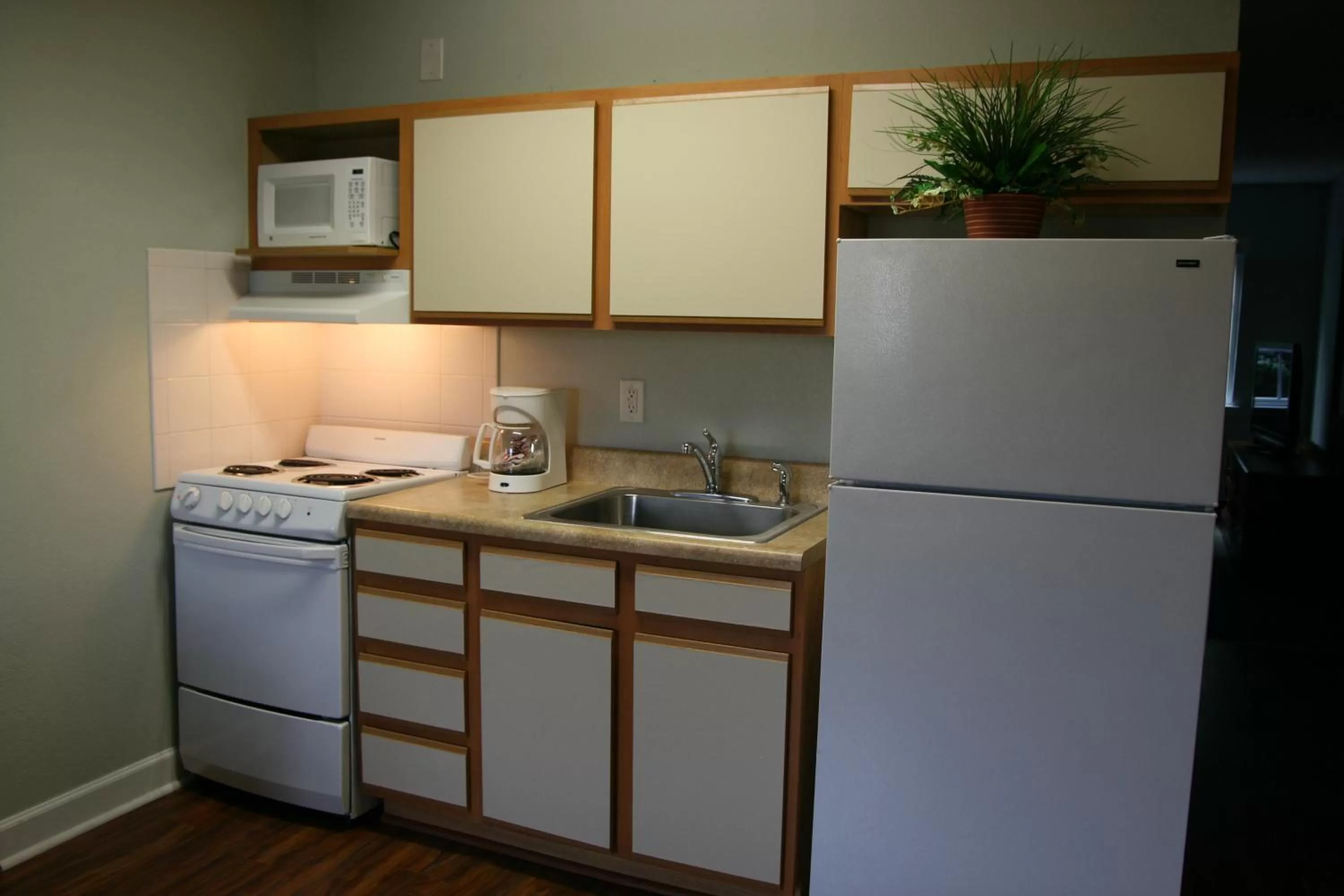 Kitchen or kitchenette in Affordable Suites Jacksonville