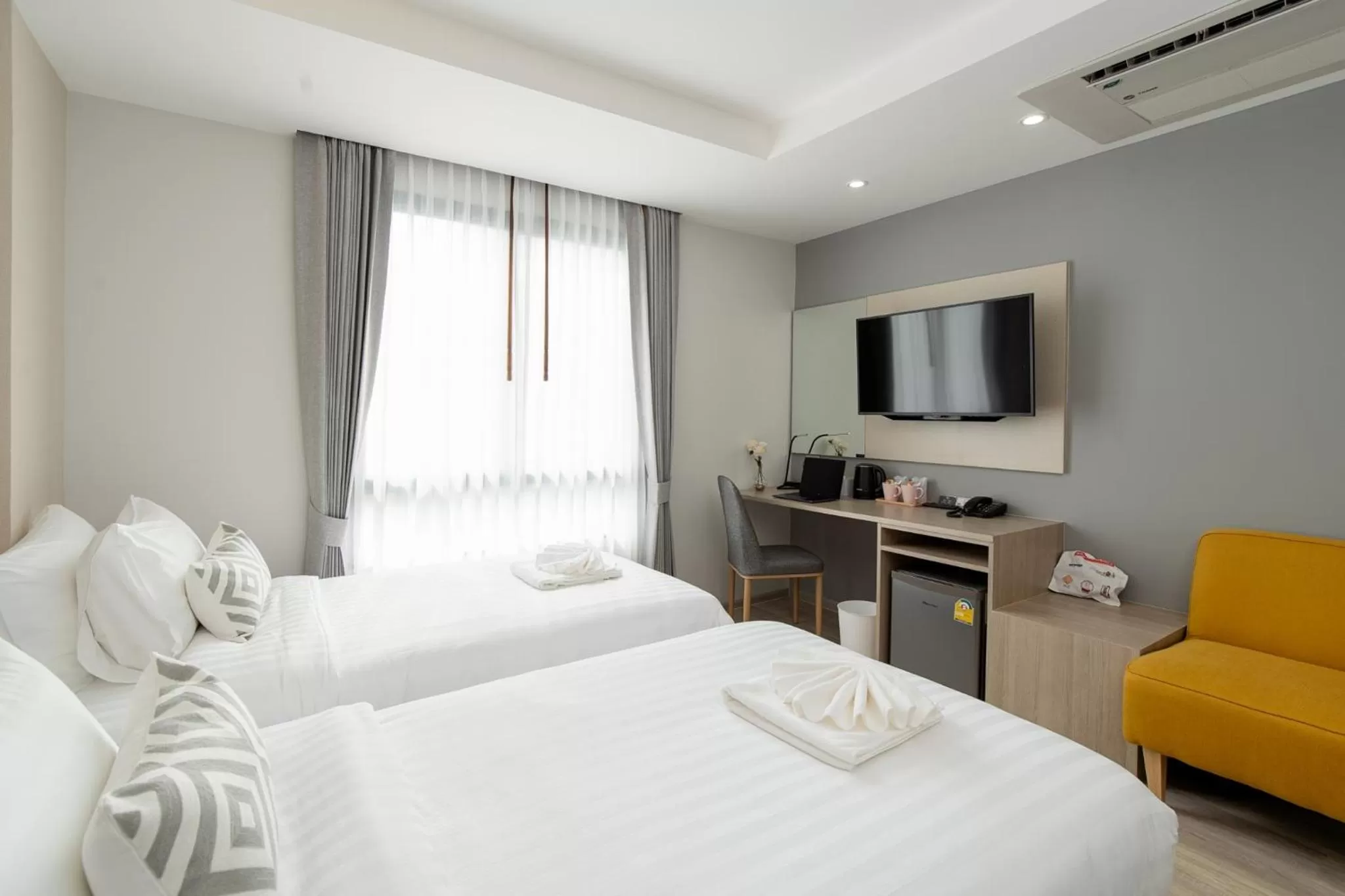 Bed in The Riski Hotel at Bangphlat Station SHA