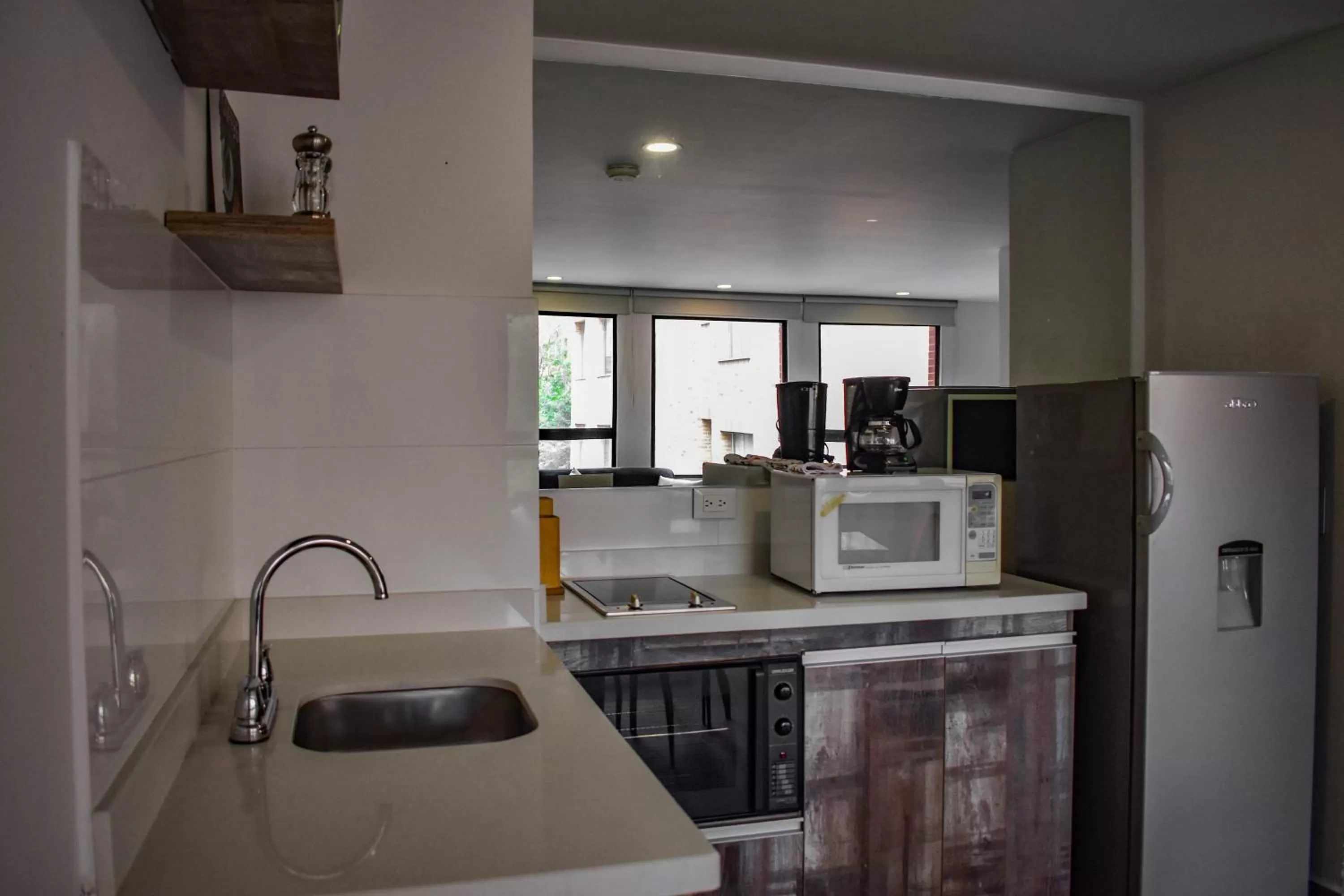 Kitchen or kitchenette in Cora 96 Street Apartments