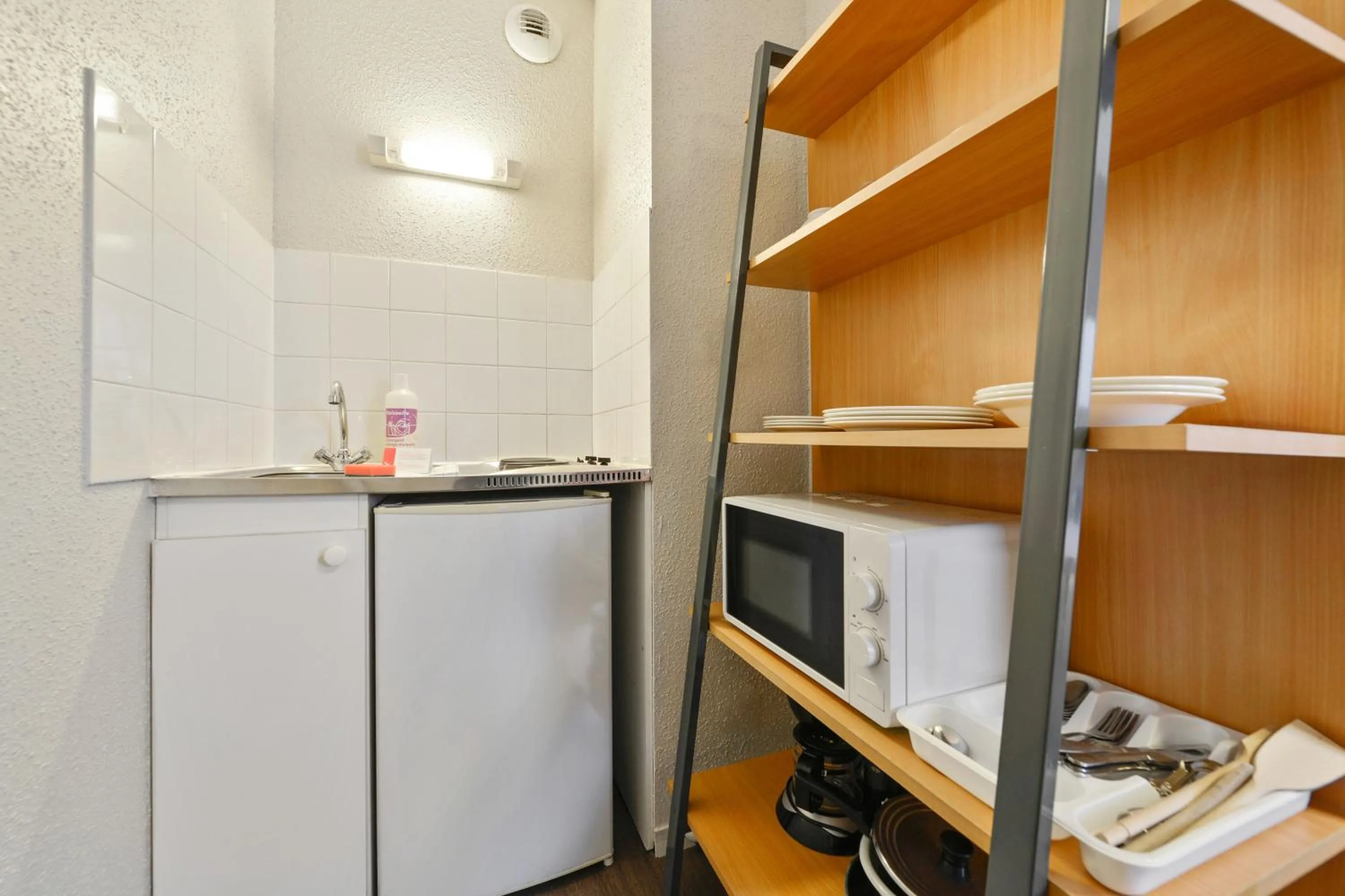 Kitchen or kitchenette in Appart'City Classic Nantes Viarme