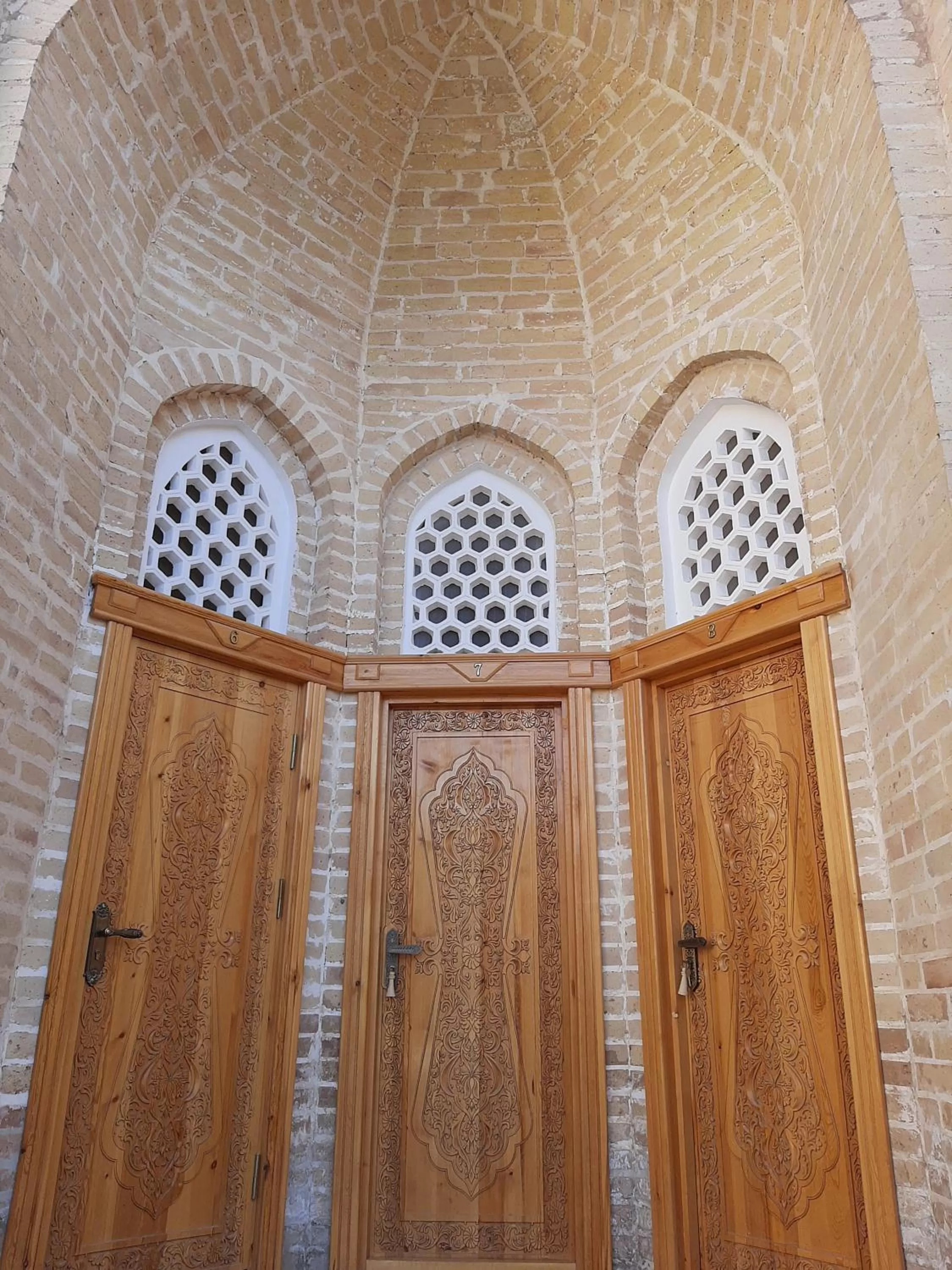 Decorative detail in madrasah Polvon-Qori boutique hotel XIX century