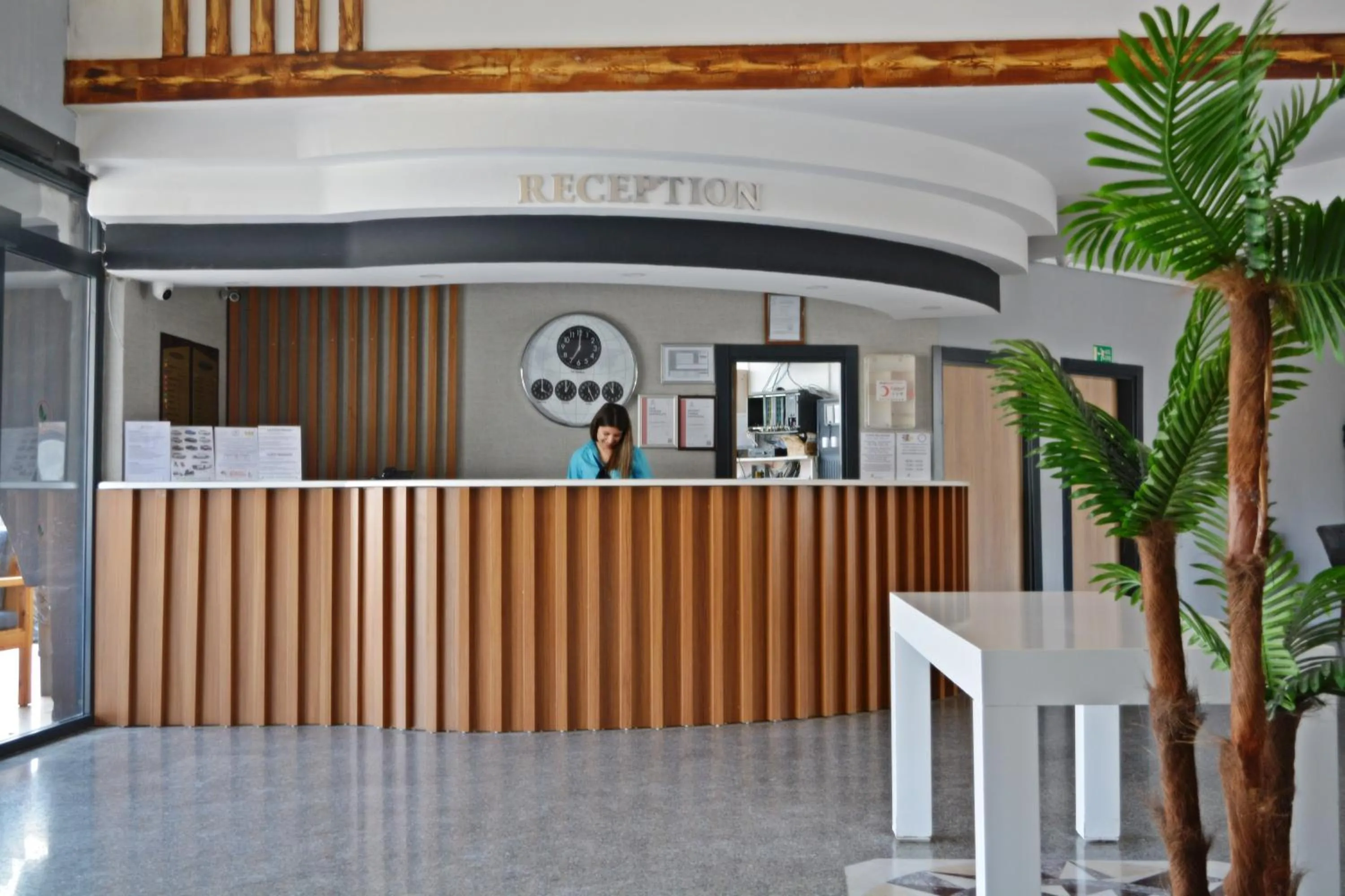 Staff in Clover Magic Park Side Hotel