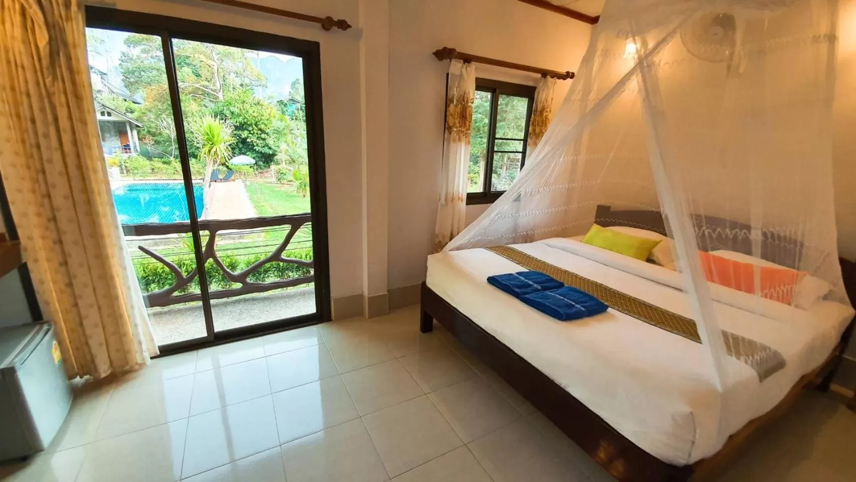 Bed in Tree Tops River Huts