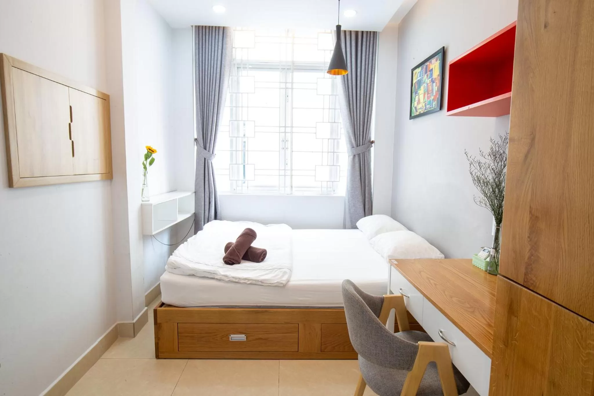 Living room, Bed in HOSTIE SAIGON [WANDERLUST Home]