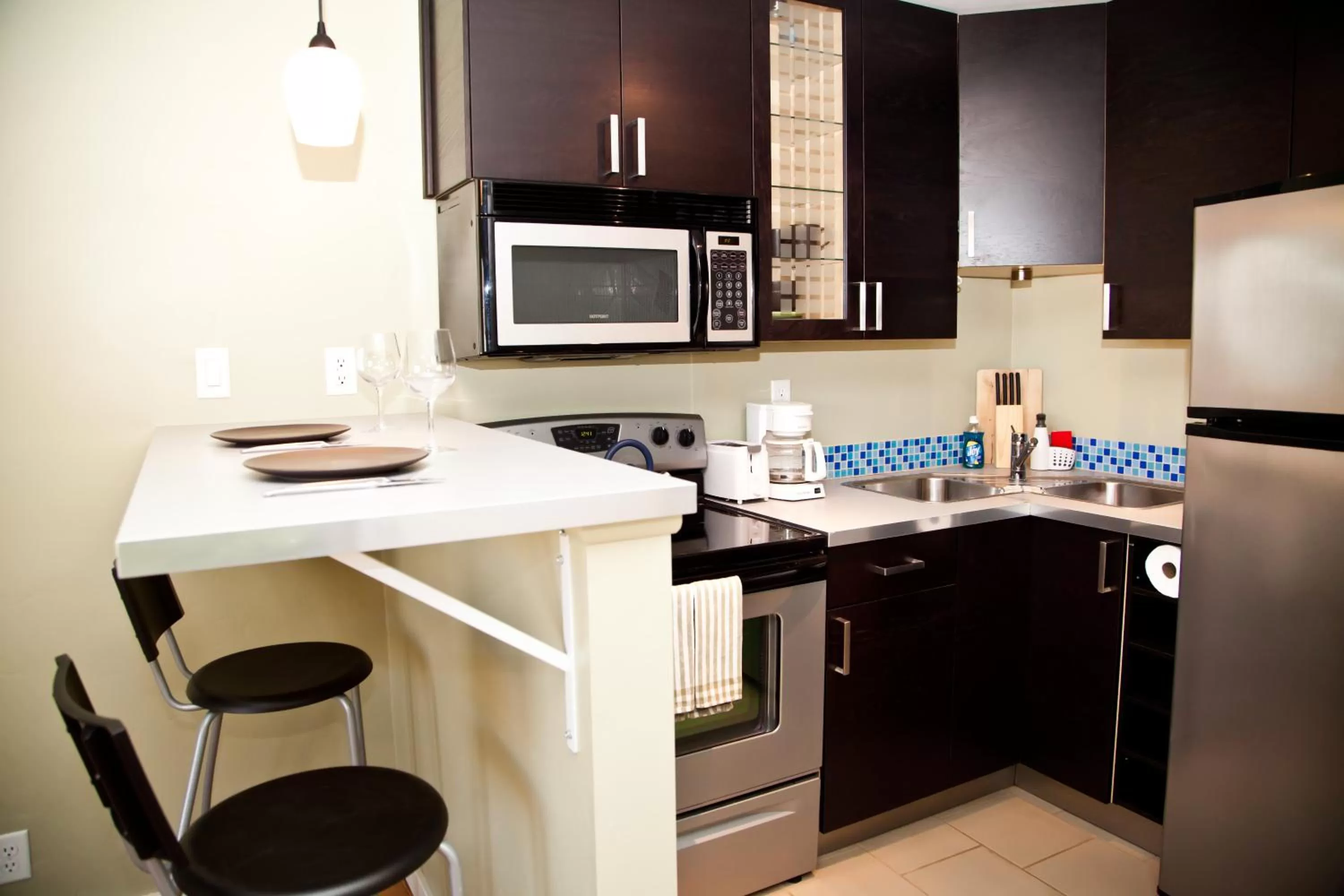 Kitchen or kitchenette, Kitchen/Kitchenette in The Flagstone Boutique Inn & Suites