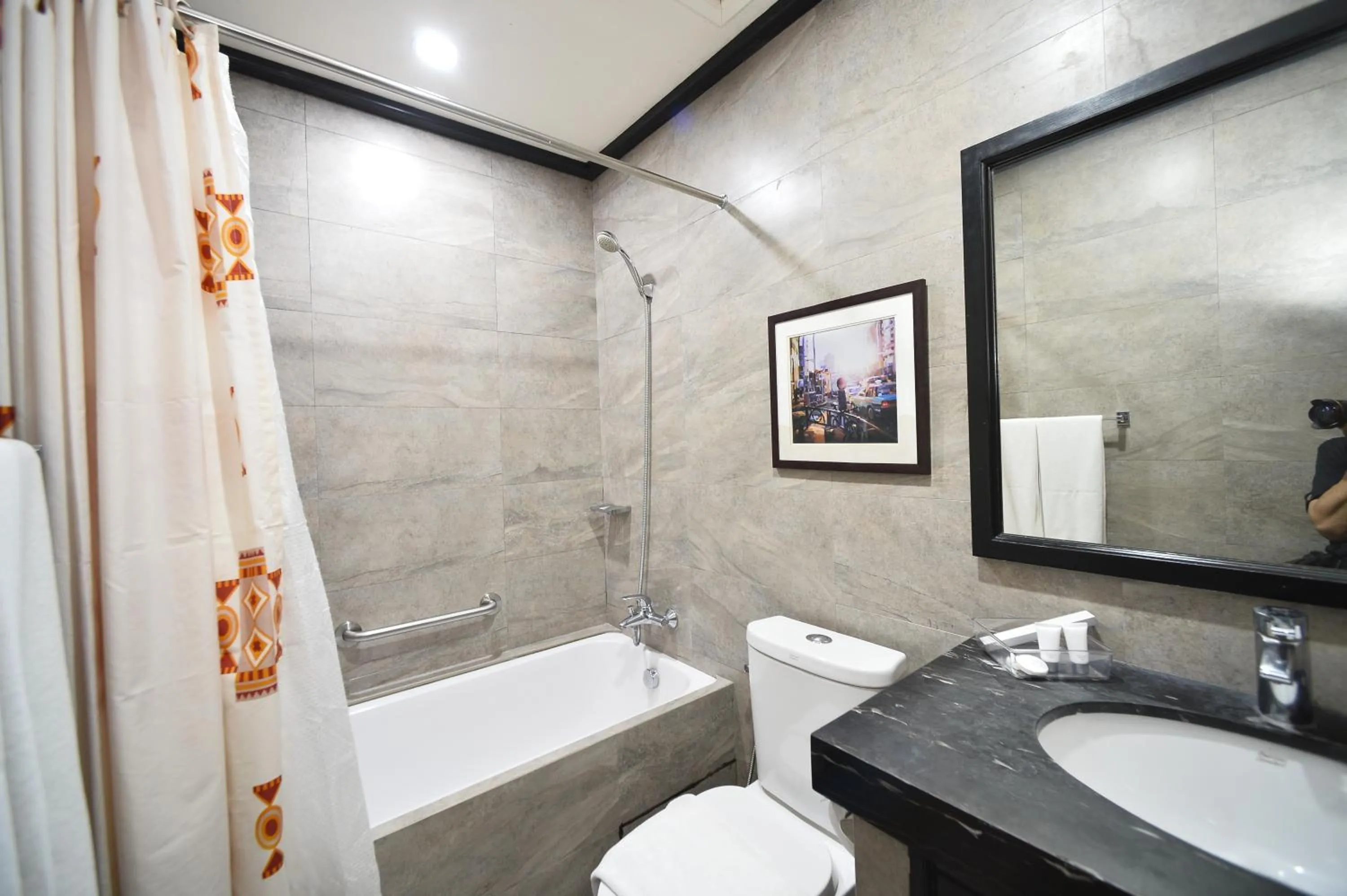 Bathroom in Paragon Hotel and Suites