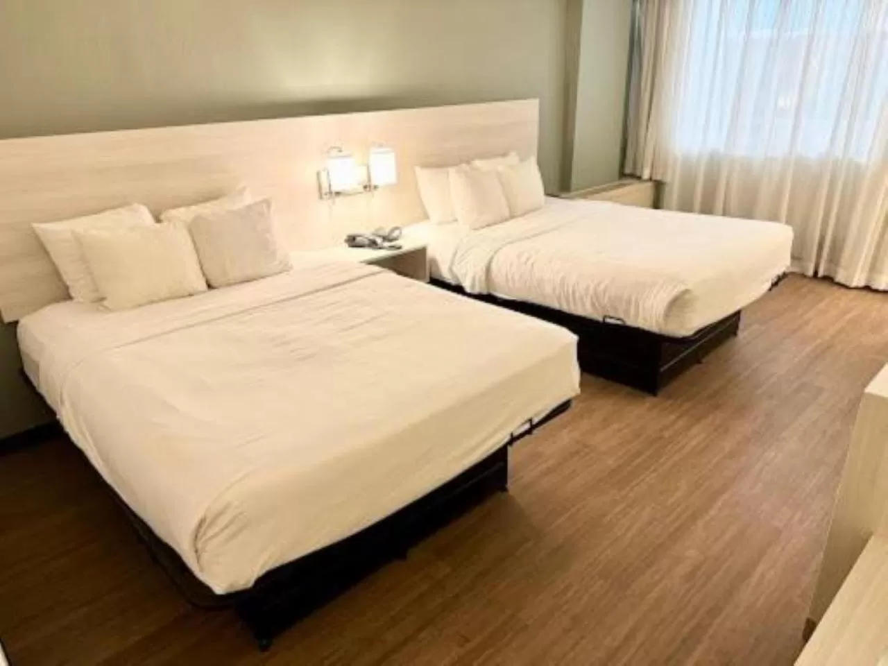 Bed in Quality Inn & Suites East Syracuse - Carrier Circle