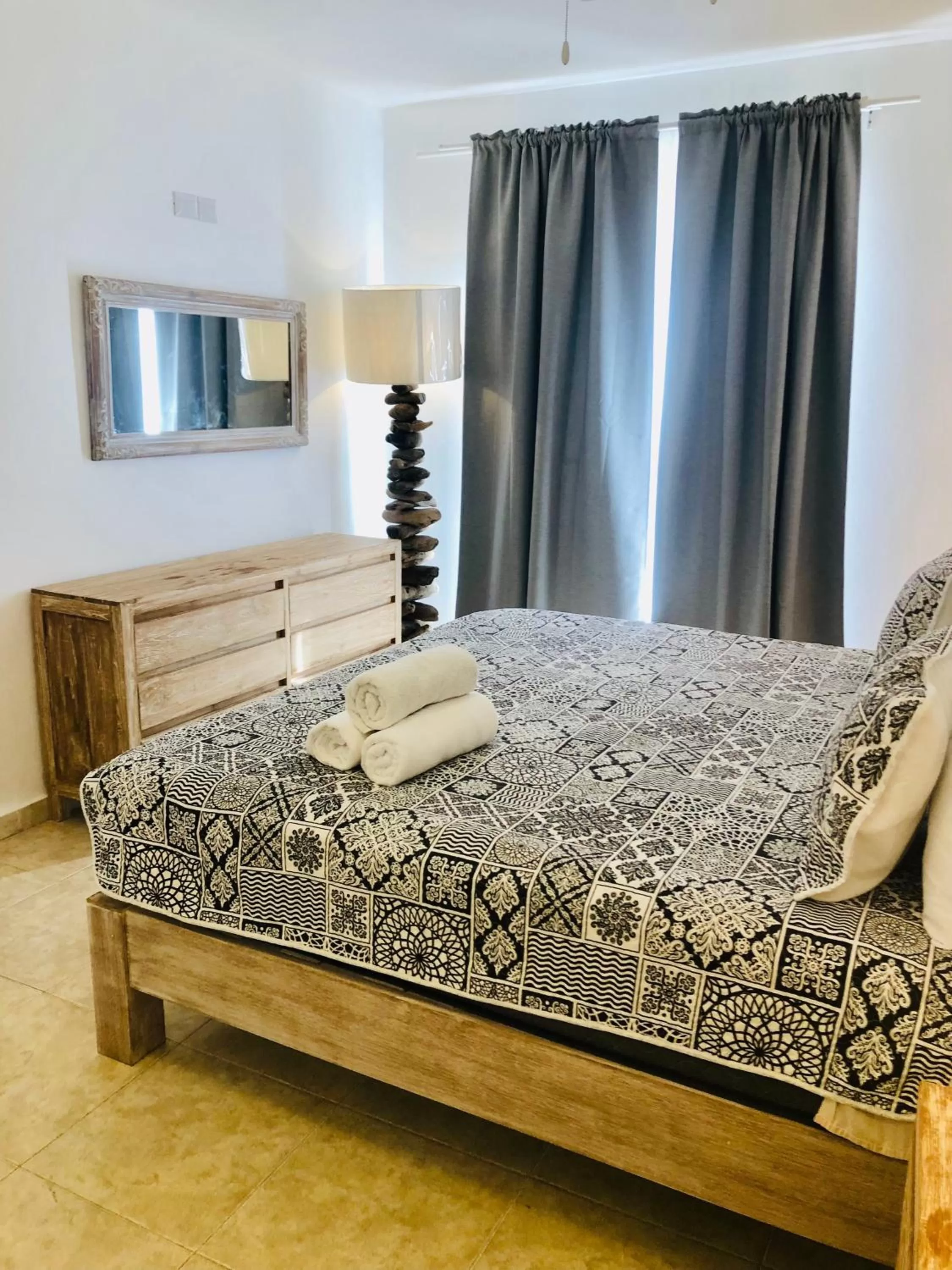 Bed in Los Corales Luxury Villas Beach Club and Spa