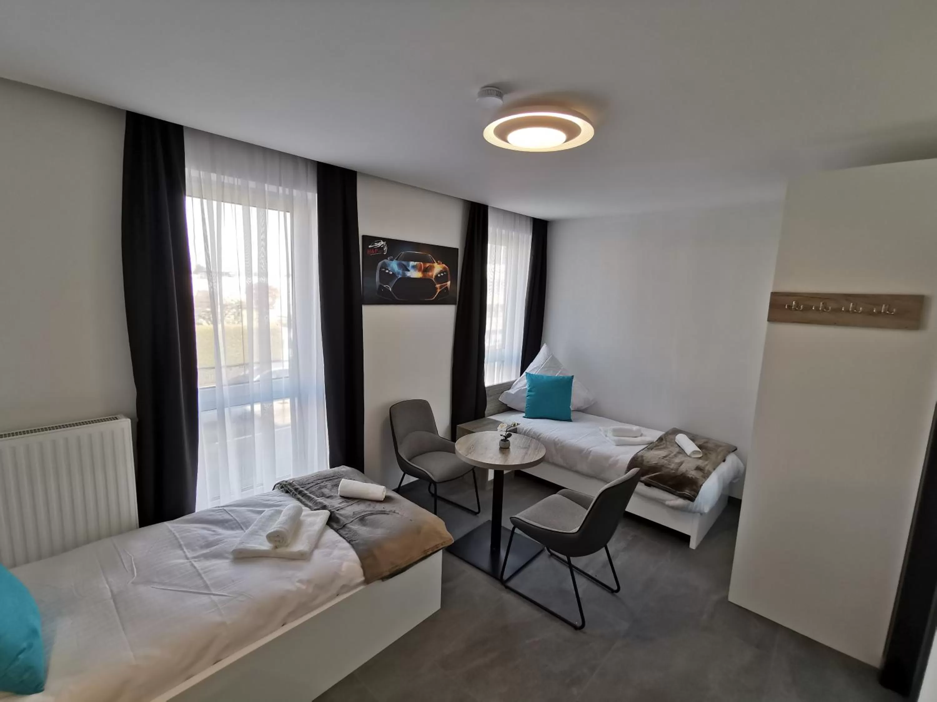 Living room, Bed in HP Apartments