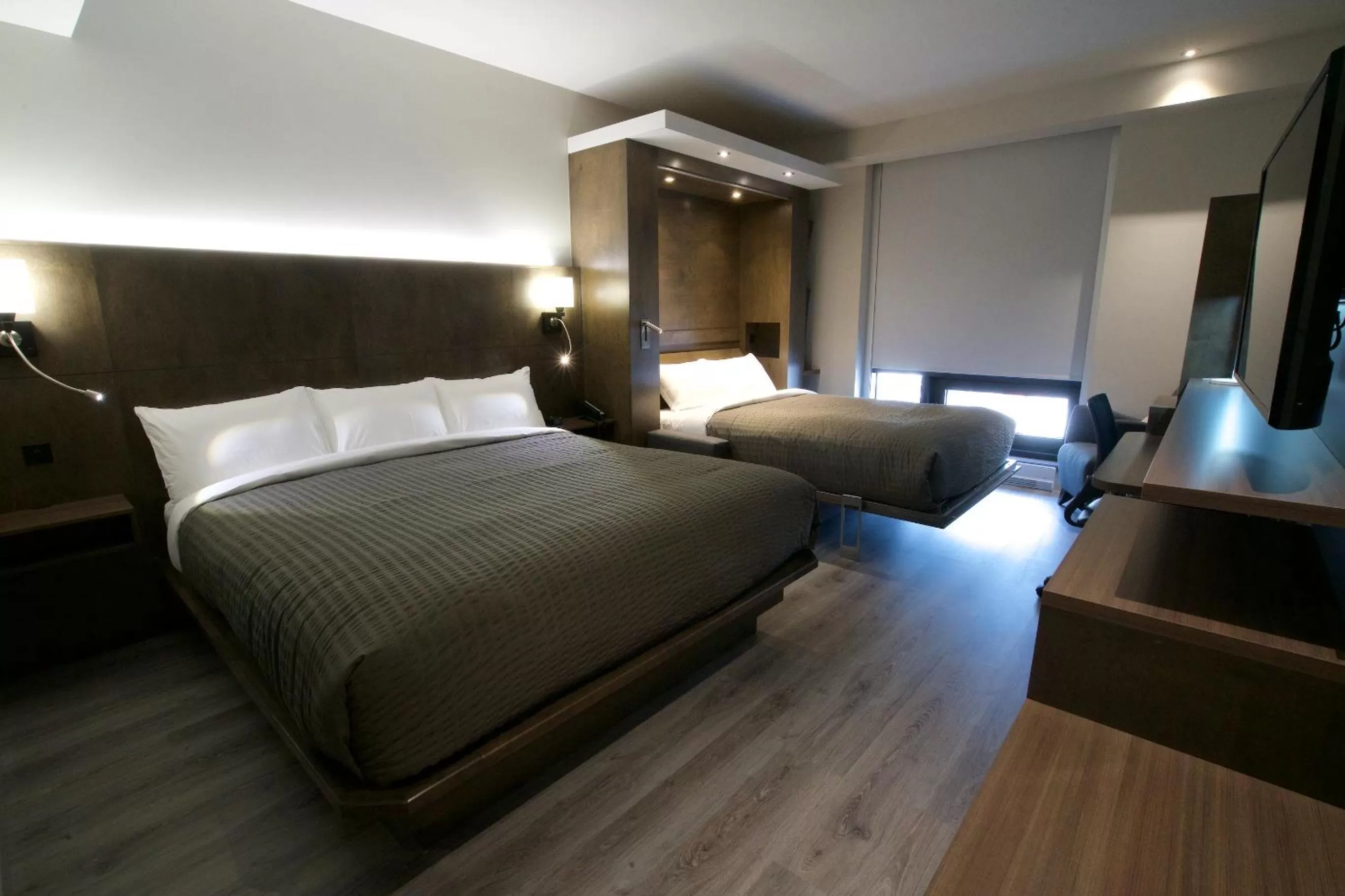 Bed in Hôtel & Suites Normandin Lévis