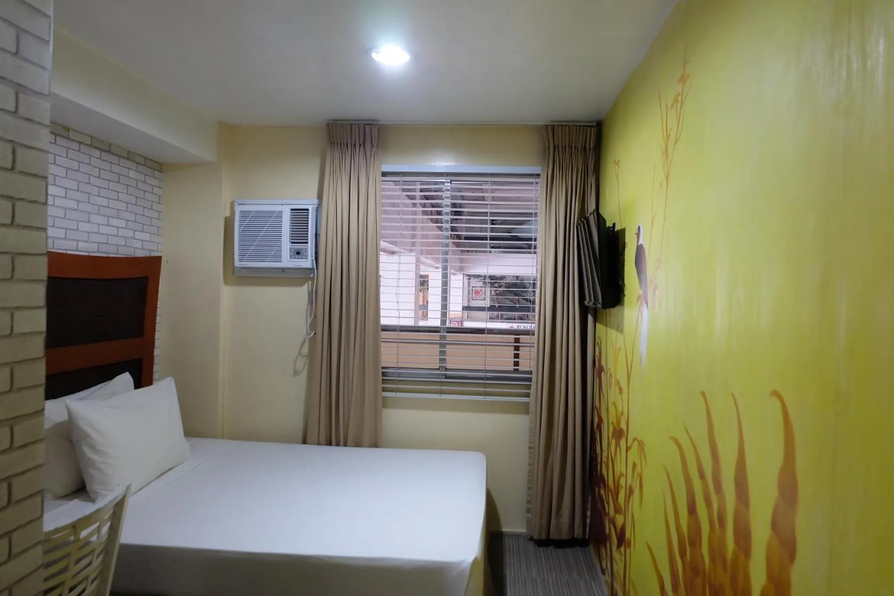 Bedroom, Bed in Spaces Hotel Makati