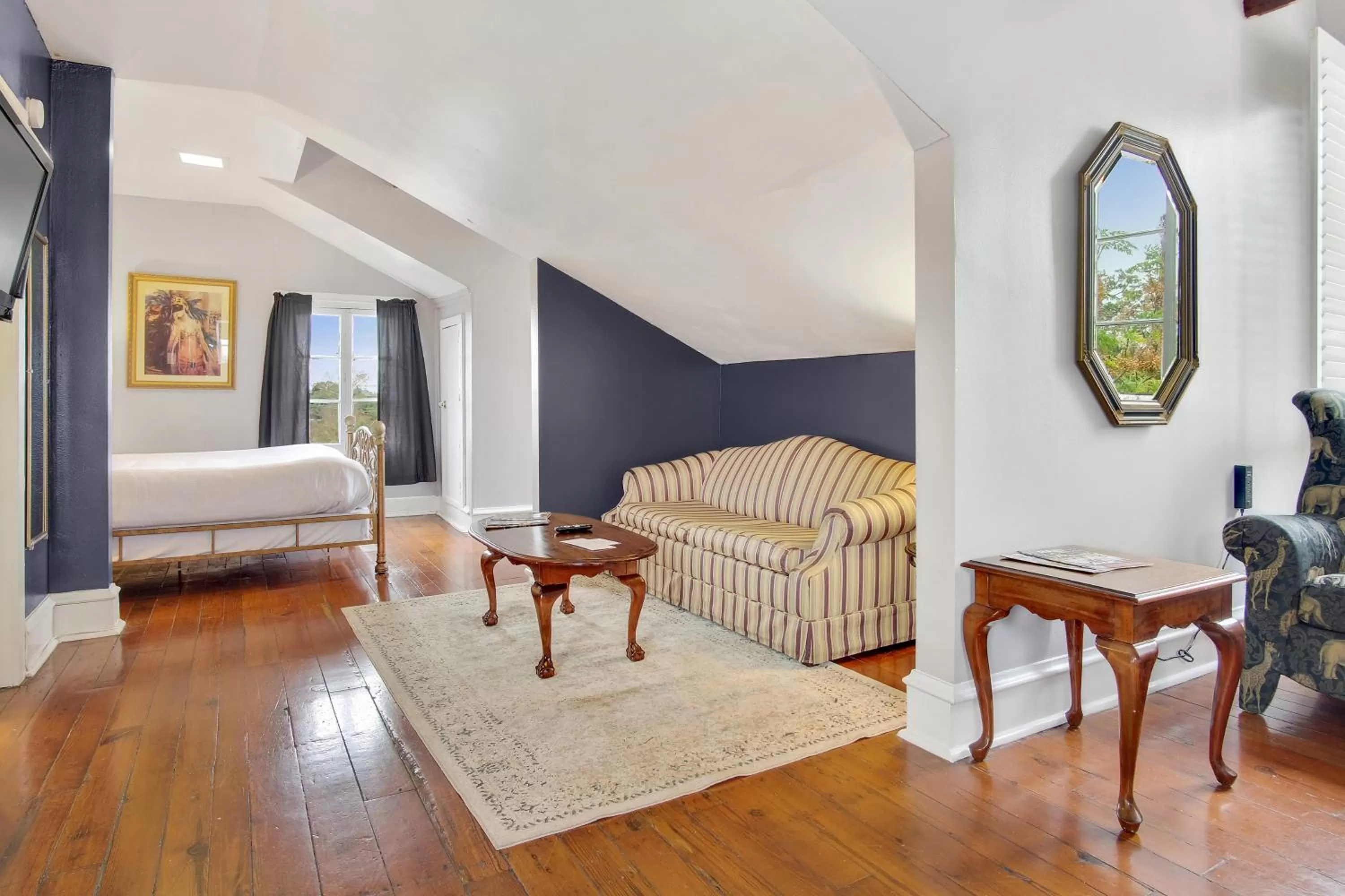 Seating area, Bed in Rathbone Mansions New Orleans