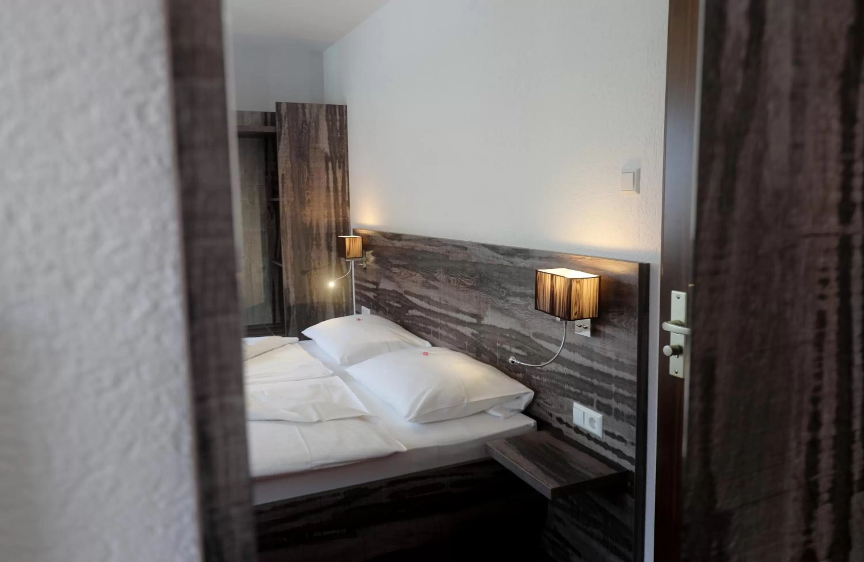 Bed in stadthotel miya