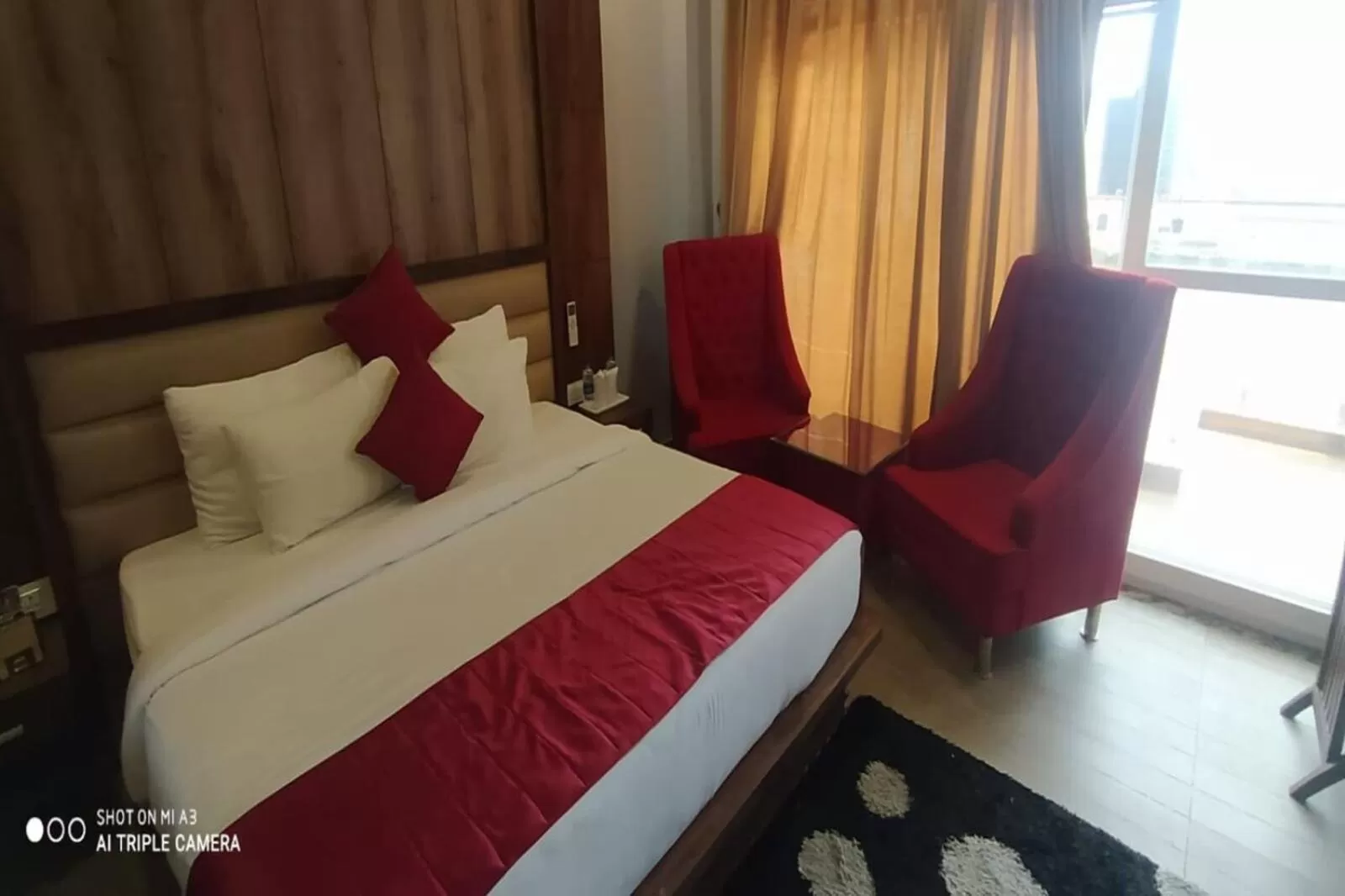 Bed in Shivaay Morex- A Vegetarian Hotel