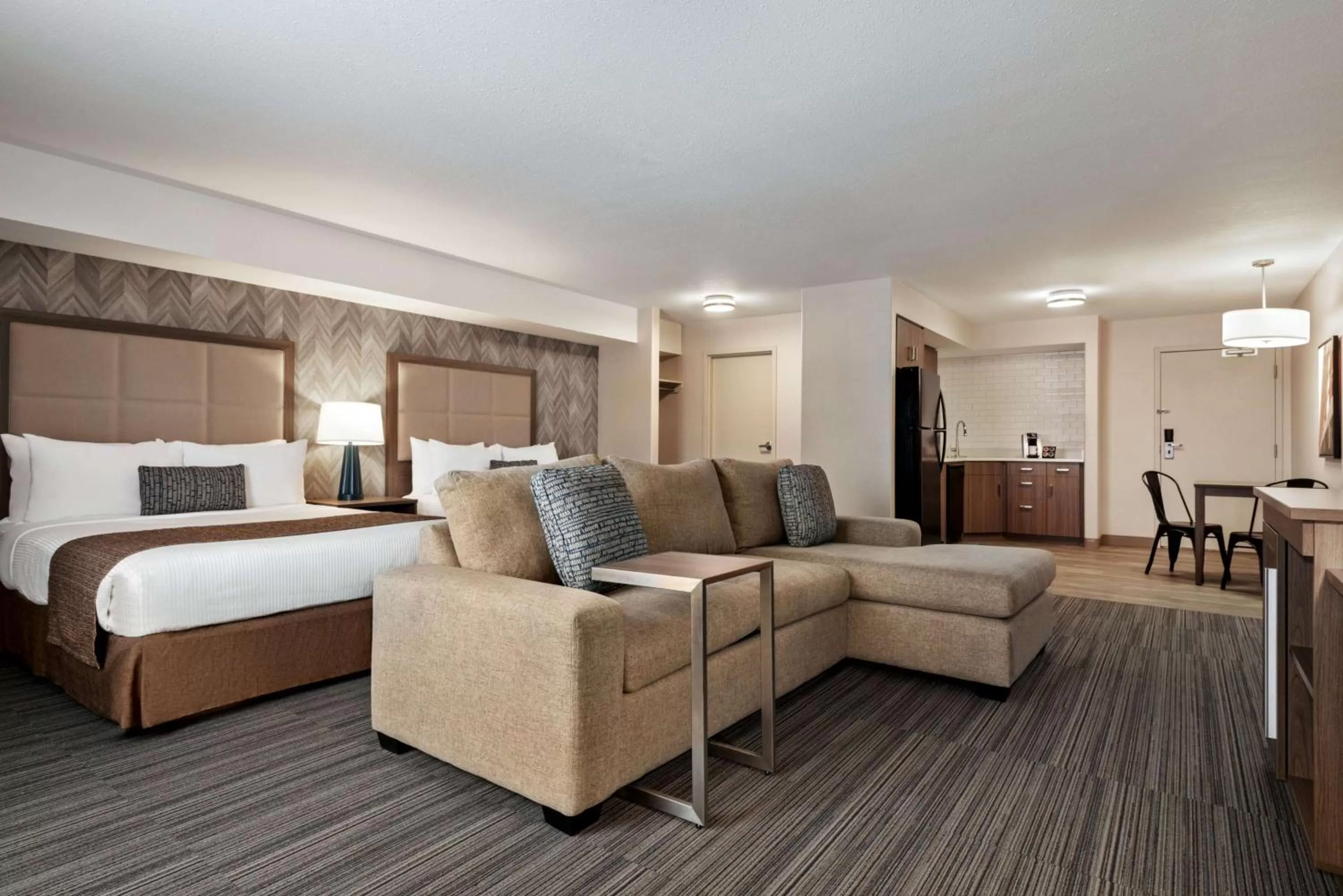 Photo of the whole room, Bed in Ramada by Wyndham Airdrie Hotel & Suites