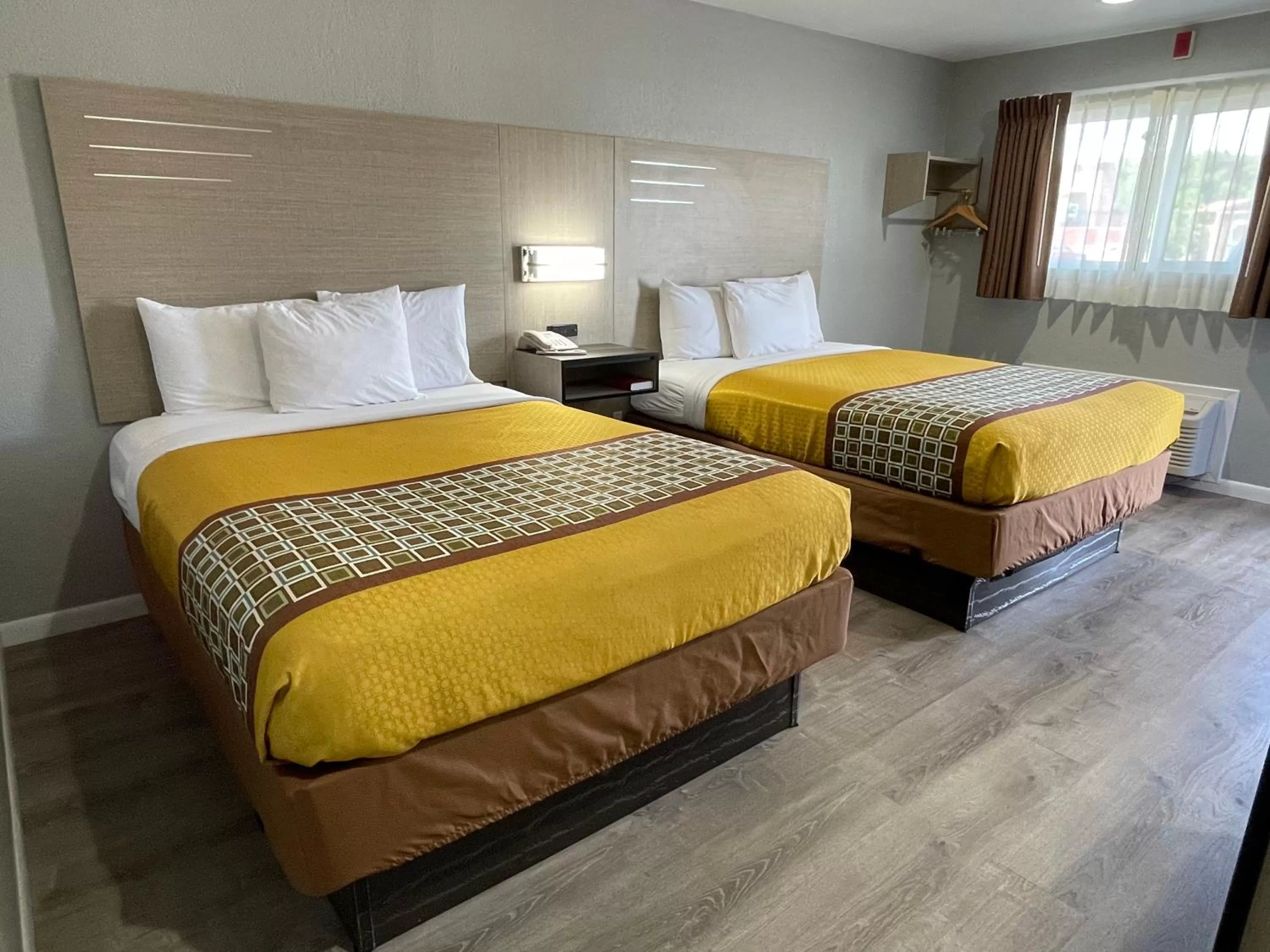 Bed in Copper Manor Motel